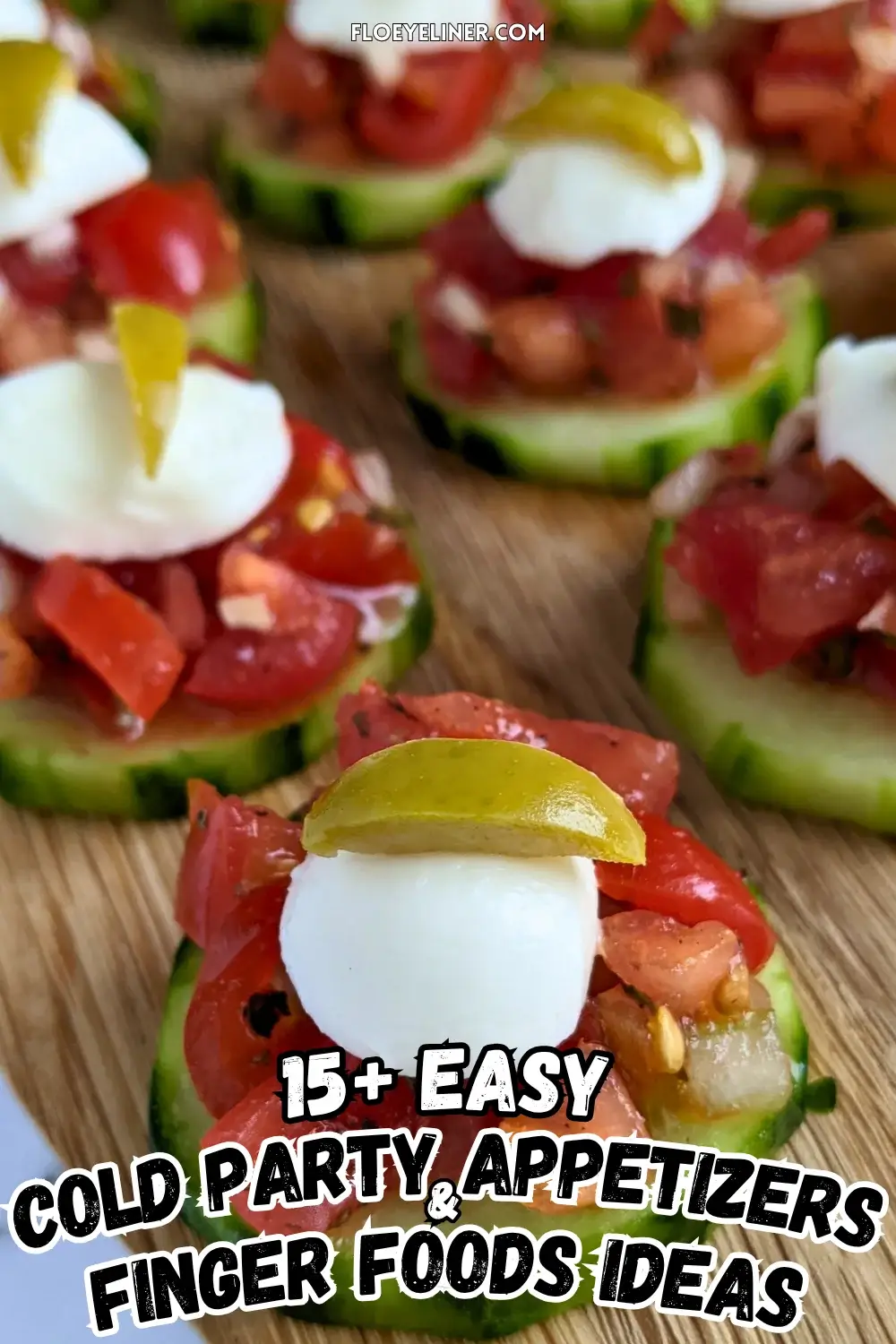 Bruschetta Cucumber Bites Appetizers - Fresh bruschetta cucumber bites appetizers topped with mozzarella balls and sliced olives, neatly arranged on a serving tray.