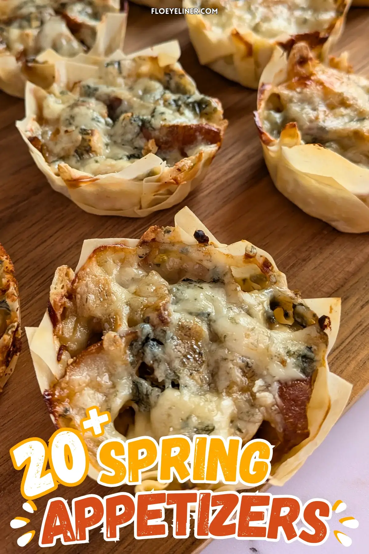 Caramelized Onion Pear and Blue Cheese Phyllo Cups - easy cheesy phyllo cups appetizers filled with slices of prosciutto, caramelized onions, fresh pears, and topped with crumbled blue cheese.