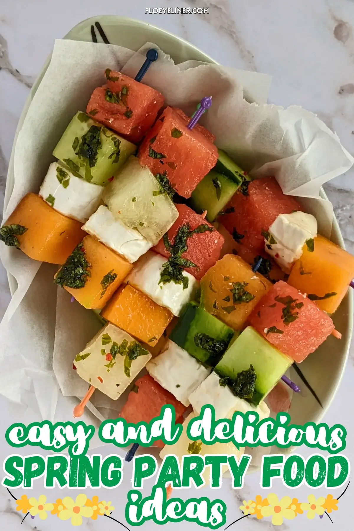 Goat Cheese Toothpick Appetizers With Melon, Watermelon, and Cucumber - colorful fruit and cheese skewers made with cubes of melon, watermelon, cucumber, and goat cheese, drizzled with a spicy mint vinaigrette.