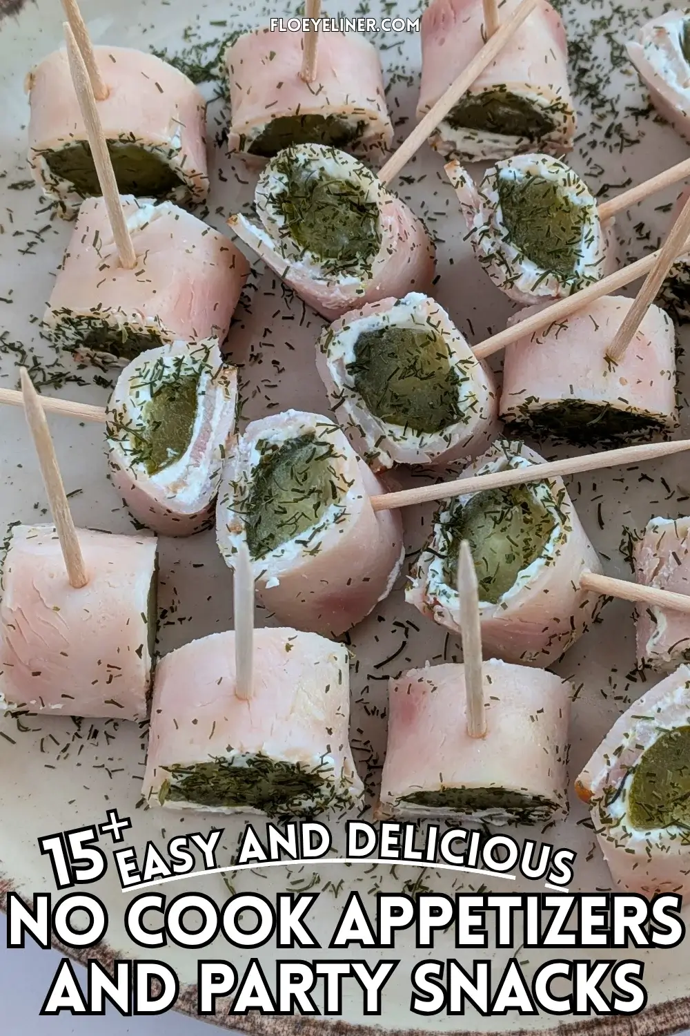 Ham Pickle Roll Ups With Garlic Cream Cheese - mini appetizer bites made with sliced breakfast ham, garlic cream cheese, and dill pickles.