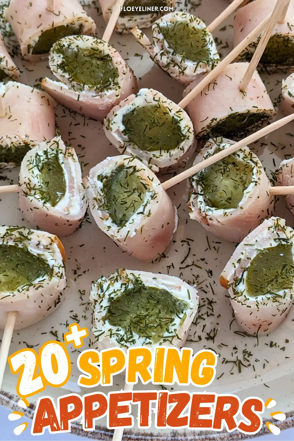 Ham Pickle Roll Ups With Garlic Cream Cheese - mini appetizer bites made with sliced breakfast ham, garlic cream cheese, and dill pickles.