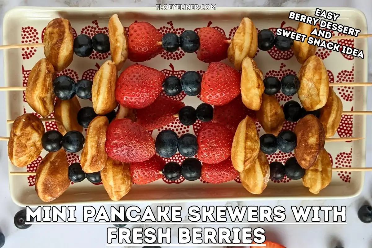 Mini Pancake Skewers With Fresh Berries - dessert skewers on toothpicks made with alternating layers of mini pancakes and fresh strawberries and blueberries.