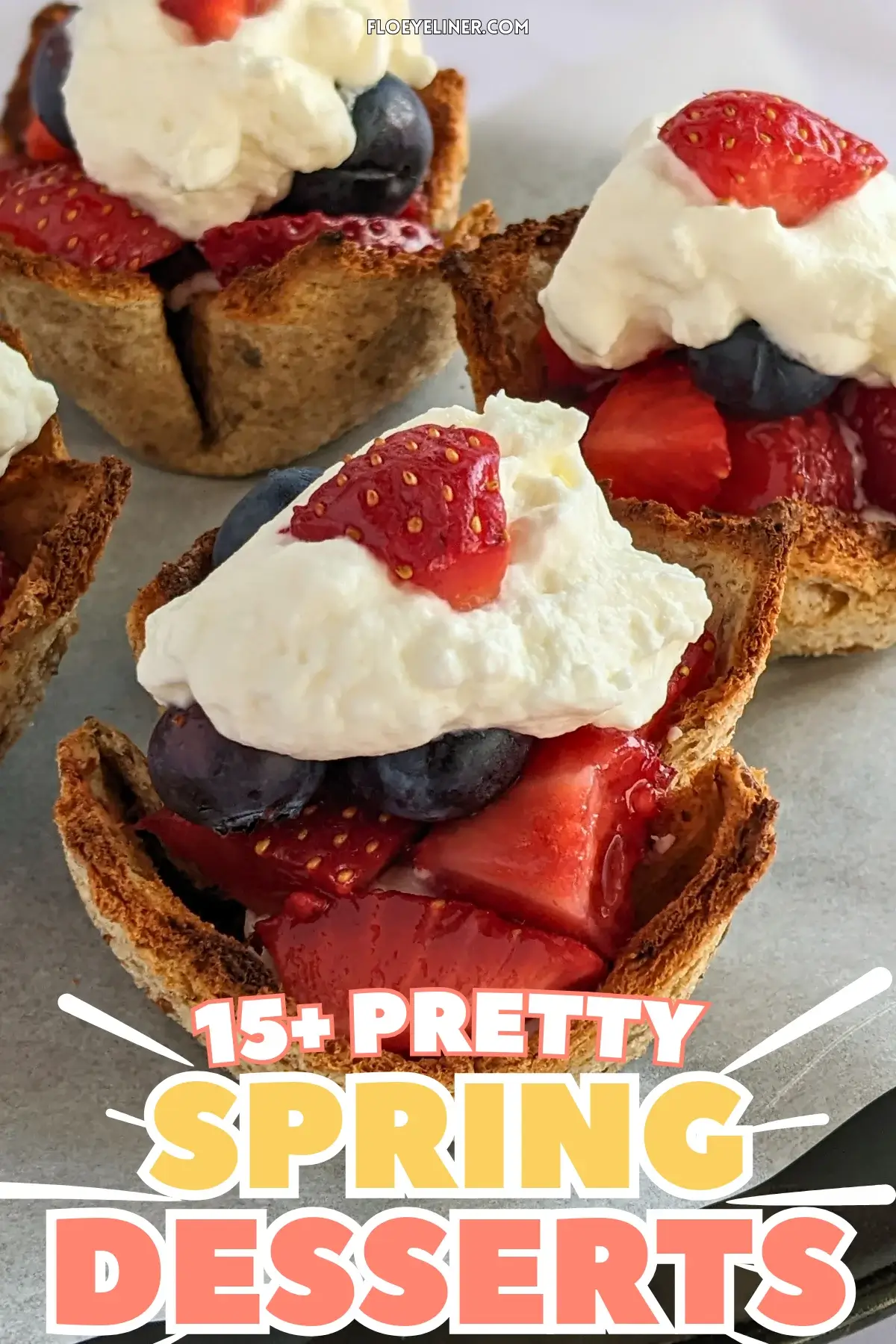 Mixed Berry Dessert Toast Cups With Whipped Cream - muffin-tin baked mini dessert cups made from white bread, filled with a spoon of sweet ricotta and mixed berries like strawberries and blueberries, topped with whipped cream.