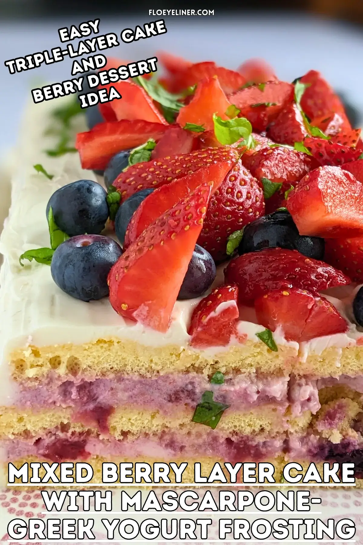 Mixed Berry Layer Cake With Mascarpone Greek Yogurt Frosting - triple-layer sponge cake with a blueberry-strawberry filling and mascarpone-Greek yogurt frosting, topped with fresh strawberries and blueberries.
