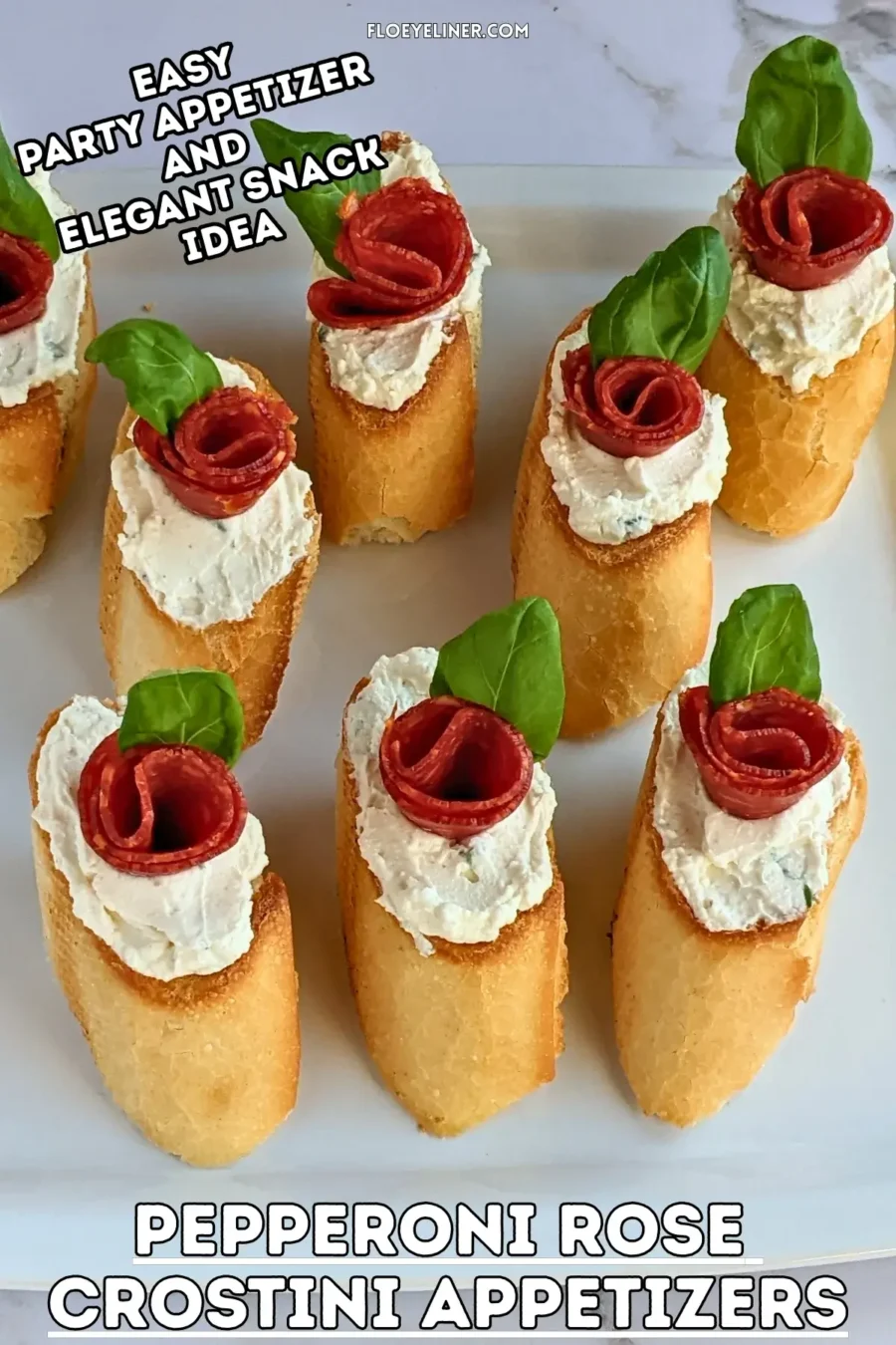 Pepperoni Rose Crostini Appetizers - oven-baked crostini toasts topped with homemade dried onion-fresh thyme cream cheese, slices of pepperoni rolled into roses, and fresh basil leaves for rose leaves.