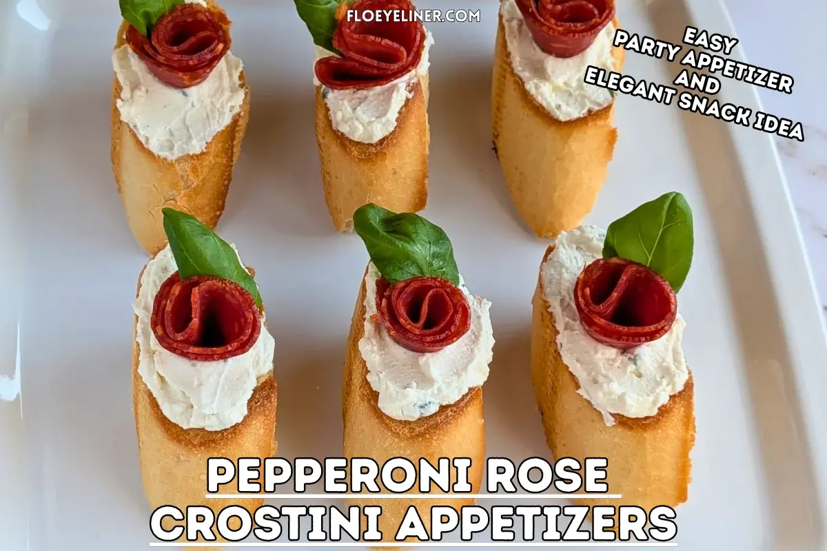 Pepperoni Rose Crostini Appetizers - oven-baked crostini toasts topped with homemade dried onion-fresh thyme cream cheese, slices of pepperoni rolled into roses, and fresh basil leaves for rose leaves.