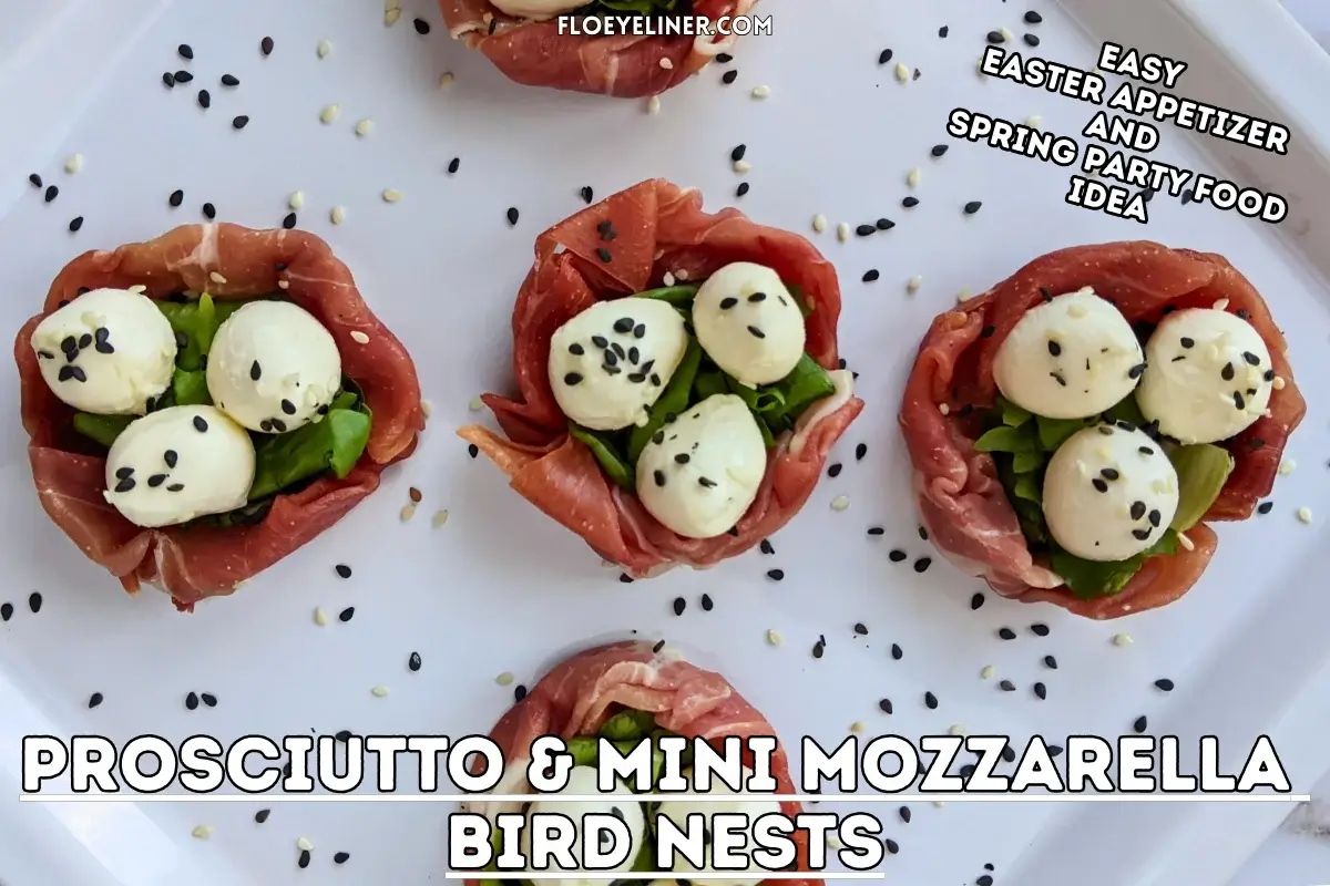 Prosciutto and Mini Mozzarella Bird Nests - easy 4-ingredient prosciutto and mozzarella appetizer with the prosciutto slices forming bird nests and the mini mozzarella balls sitting on green salad leaves as eggs, topped with black and white sesame seeds for speckles.