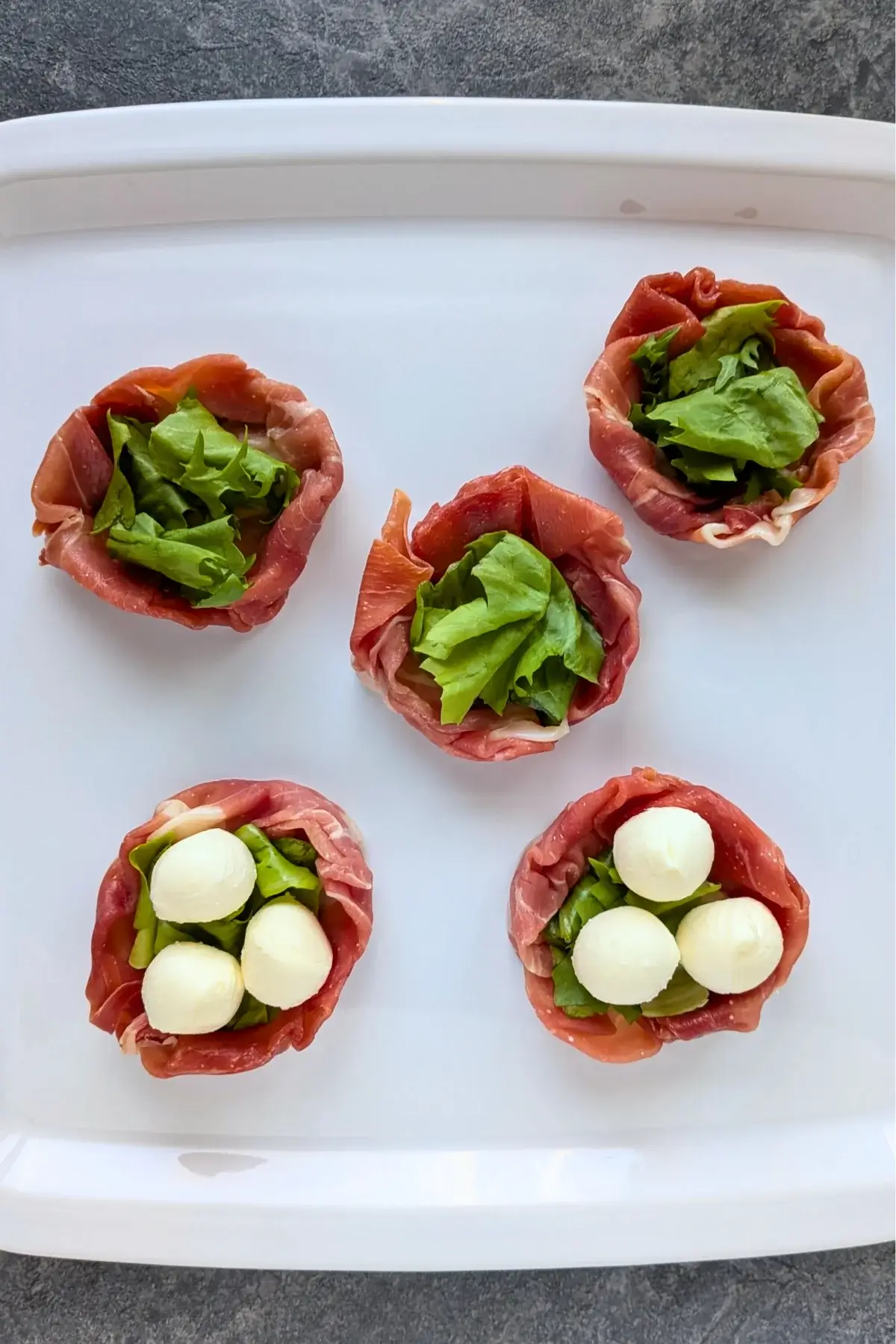 Prosciutto and Mini Mozzarella Bird Nests recipe process image.