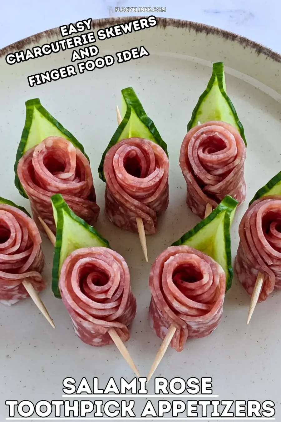 Salami Rose Toothpick Appetizers - easy and elegant party finger food on toothpicks made with slices of salami rolled up into roses and cucumber slices for leaves.