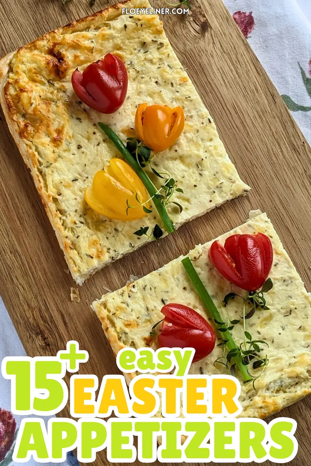 Savory Ricotta Puff Pastry Tart With Cherry Tomato Flowers - spring-themed puff pastry appetizer or dinner tart topped with a garlicky ricotta and grated Pecorino and cheese filling, topped with fresh red, orange, and yellow cherry tomatoes cut into shapes of tulips with green onions for stems and fresh thyme sprigs for leaves.