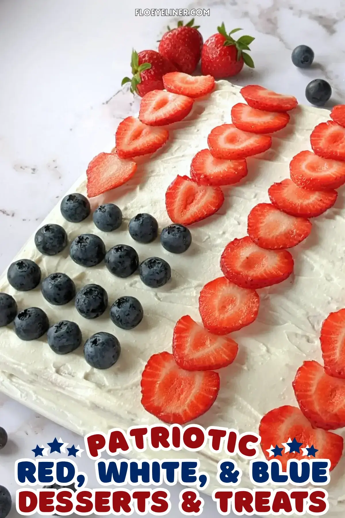 American Flag Sheet Pan Pancake - large sheet pan pancake decorated with a sweet ricotta frosting with strawberries for stripes and blueberries for stars, resembling the American flag.
