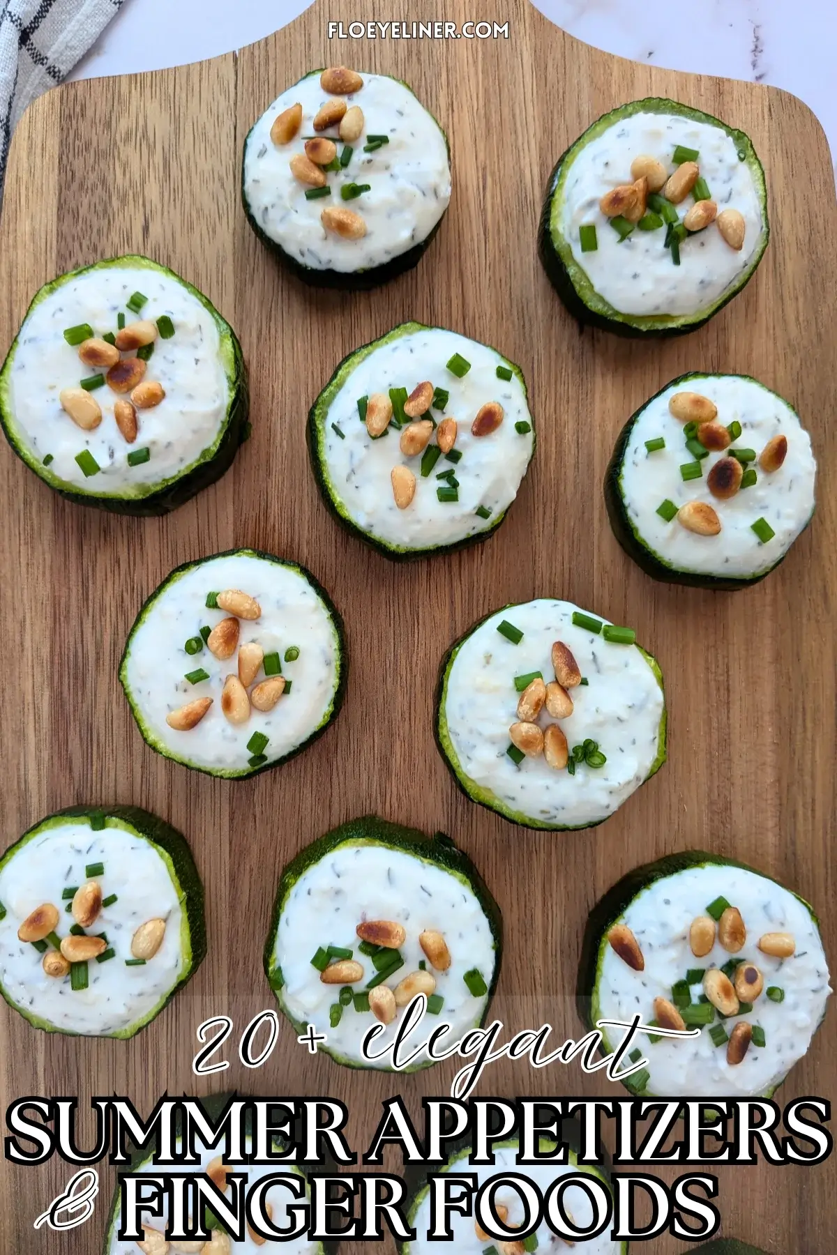 Baked Zucchini Rounds Appetizers With Goat Cheese - oven-baked zucchini rounds topped with a creamy goat cheese-Greek yogurt spread, toasted pine nuts, and fresh chives 