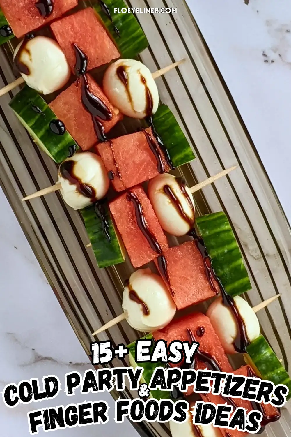 Cucumber Mozzarella Watermelon Appetizer Bites - fruit and cheese skewers made with cubes of watermelon and cucumber on toothpicks, paired with mini mozzarella balls and drizzled with balsamic glaze.