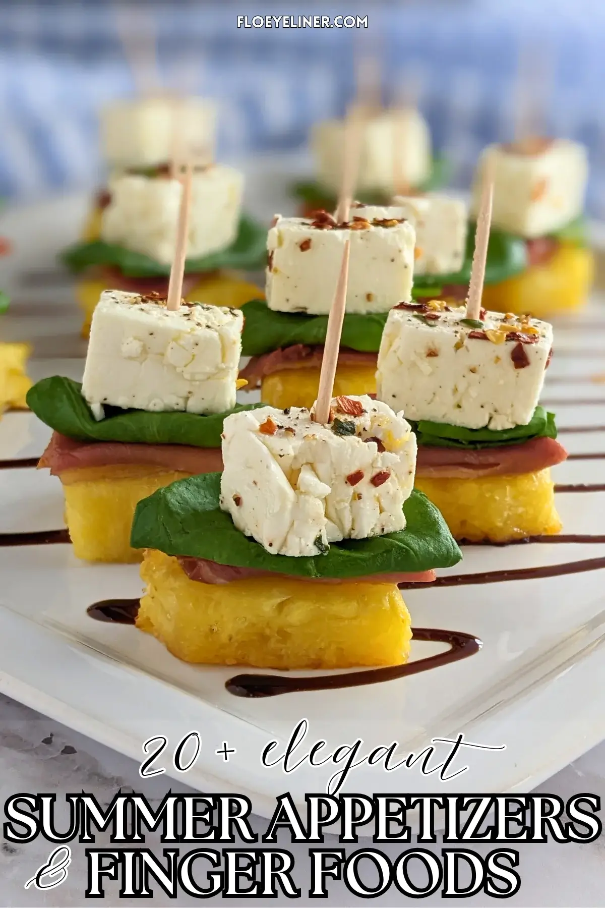 Grilled Pineapple and Marinated Feta Toothpick Appetizers - colorful fruit and cheese skewers made with fresh basil leaves nestled between prosciutto topped grilled pineapple and chili-thyme oil marinated feta cubes on toothpicks.