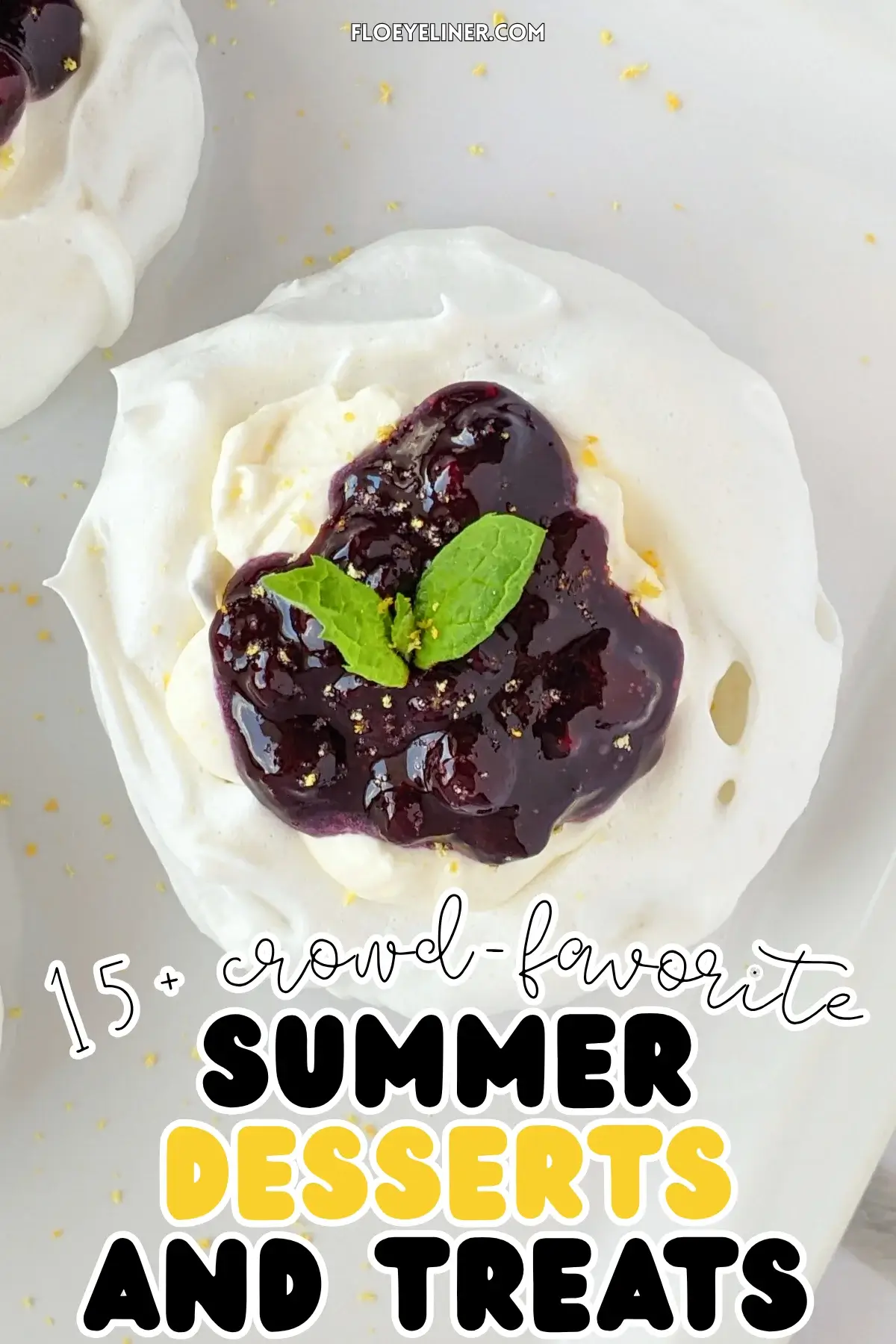 Lemon Blueberry Mini Pavlovas With Cheesecake Filling - mini pavlova nests filled with homemade lemon blueberry jam and a lemony cheesecake filling, topped with more blueberry jam and lemon zest for garnish.