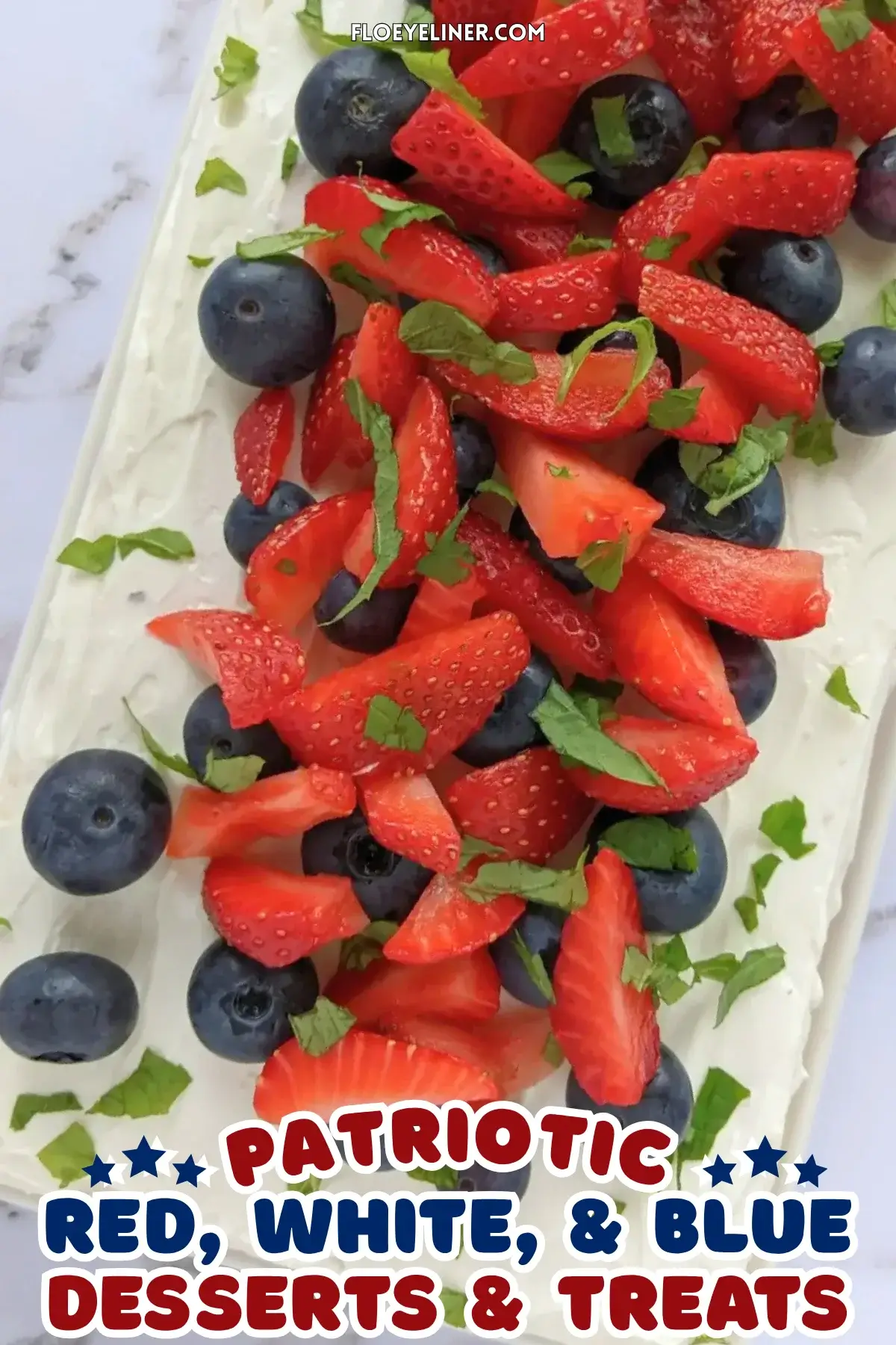 Mixed Berry Layer Cake With Mascarpone Greek Yogurt Frosting - triple-layer sponge cake with a blueberry-strawberry filling and mascarpone-Greek yogurt frosting, topped with fresh strawberries and blueberries. 