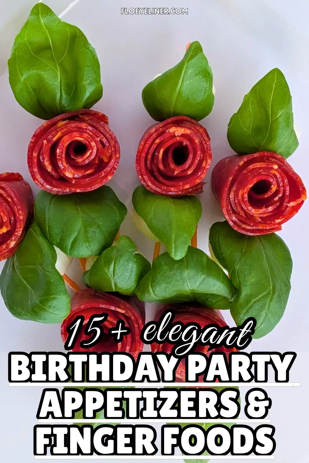 Pepperoni Rose Charcuterie Skewers - party appetizers and finger food on toothpicks made with slices of pepperoni rolled up into roses, fresh basil leaves for rose leaves, and mini mozzarella balls.