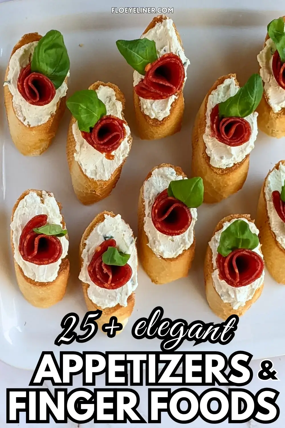 Pepperoni Rose Crostini Appetizers - oven-baked crostini toasts topped with homemade dried onion-fresh thyme cream cheese, slices of pepperoni rolled into roses, and fresh basil leaves for rose leaves.