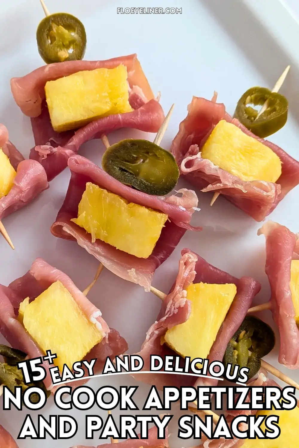 Pineapple and Prosciutto Toothpick Appetizers With Jalapenos - elegant party bites made with prosciutto wrapped fresh pineapple chunks and pickled jalapeno slices on toothpicks.