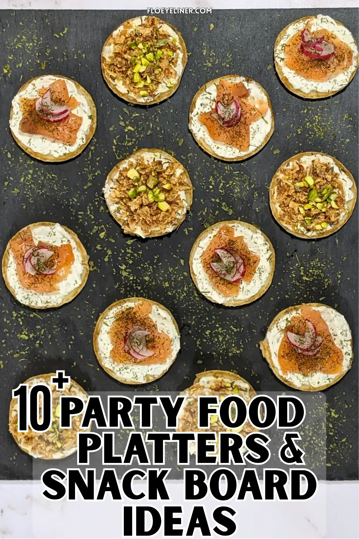 Savory Mini Pancake Appetizer and Snack Board - savory mini pancakes party platter with two types of canapes - mini pancakes topped with a creamy herb-and-garlic cream cheese spread, crispy dried onions, maple syrup, and crushed pistachios and mini pancakes topped with a creamy lemon-dill cream cheese spread, pieces of smoked salmon, and radish slices.