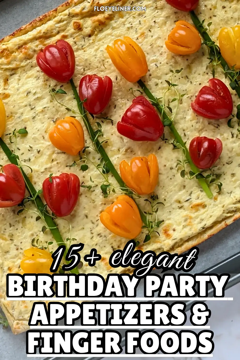 Savory Ricotta Puff Pastry Tart With Cherry Tomato Flowers - spring-themed puff pastry appetizer or dinner tart topped with a garlicky ricotta and grated Pecorino and cheese filling, topped with fresh red, orange, and yellow cherry tomatoes cut into shapes of tulips with green onions for stems and fresh thyme sprigs for leaves.