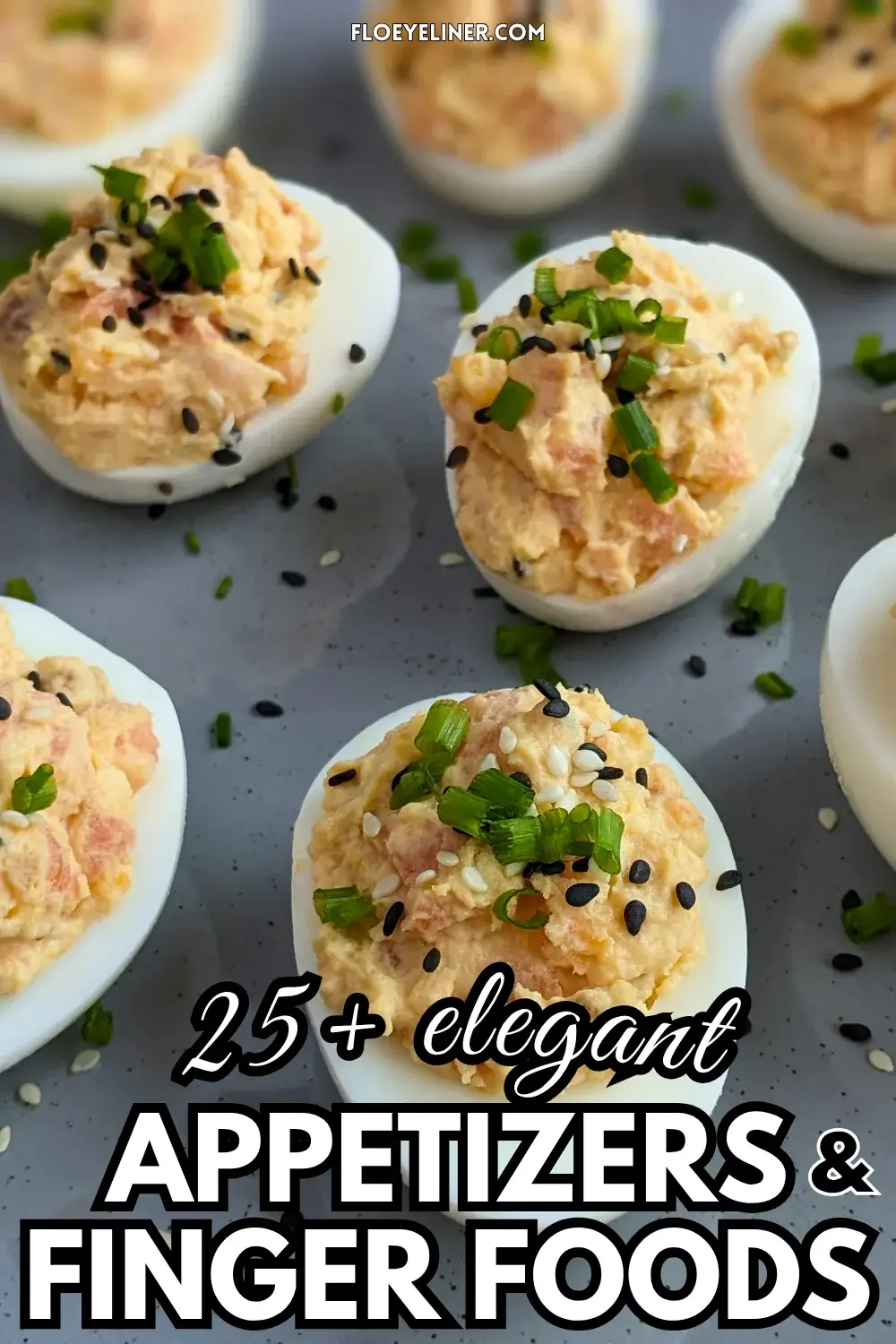 Smoked Salmon Deviled Eggs - deviled eggs filled with a creamy smoked salmon, cream cheese, sour cream, dijon mustard, and crispy dried chopped onions filling, topped with toasted sesame seeds and chopped chives.