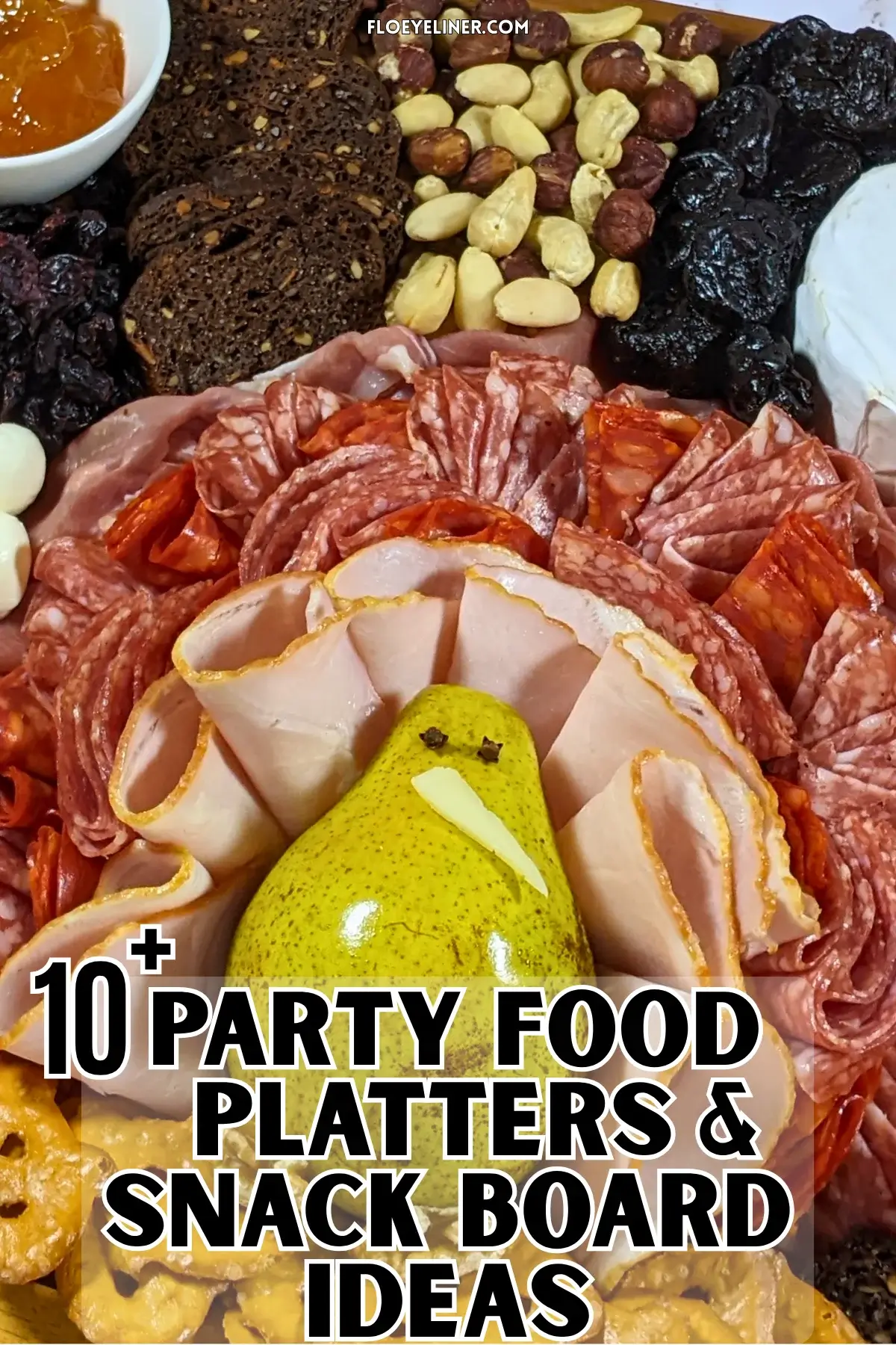 Turkey Charcuterie Board - fall themed turkey-shaped charcuterie board with different meats, cheeses, dried and fresh fruits, nuts, jams, and breads.