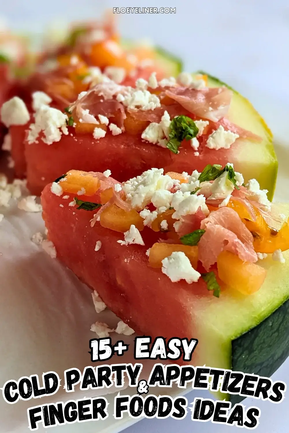 Watermelon Pizza with Melon, Prosciutto, and Feta - savory watermelon pizza appetizer or snack on a base of a fresh watermelon slice, topped with torn prosciutto pieces, pieces of melon, crumbled feta, and shredded fresh basil.