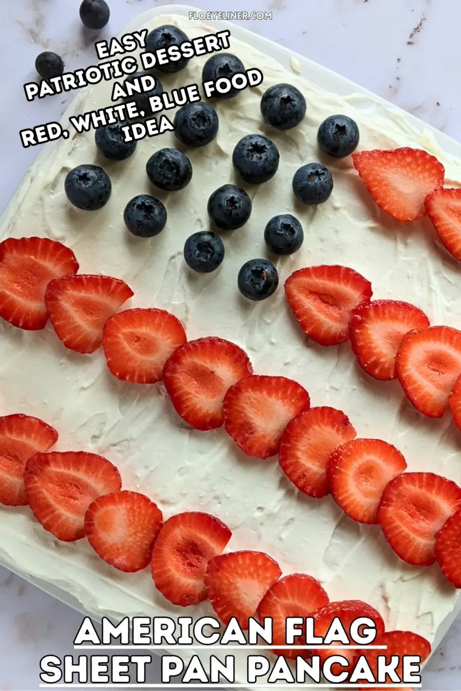 American Flag Sheet Pan Pancake - large sheet pan pancake decorated with a sweet ricotta frosting with strawberries for stripes and blueberries for stars, resembling the American flag.
