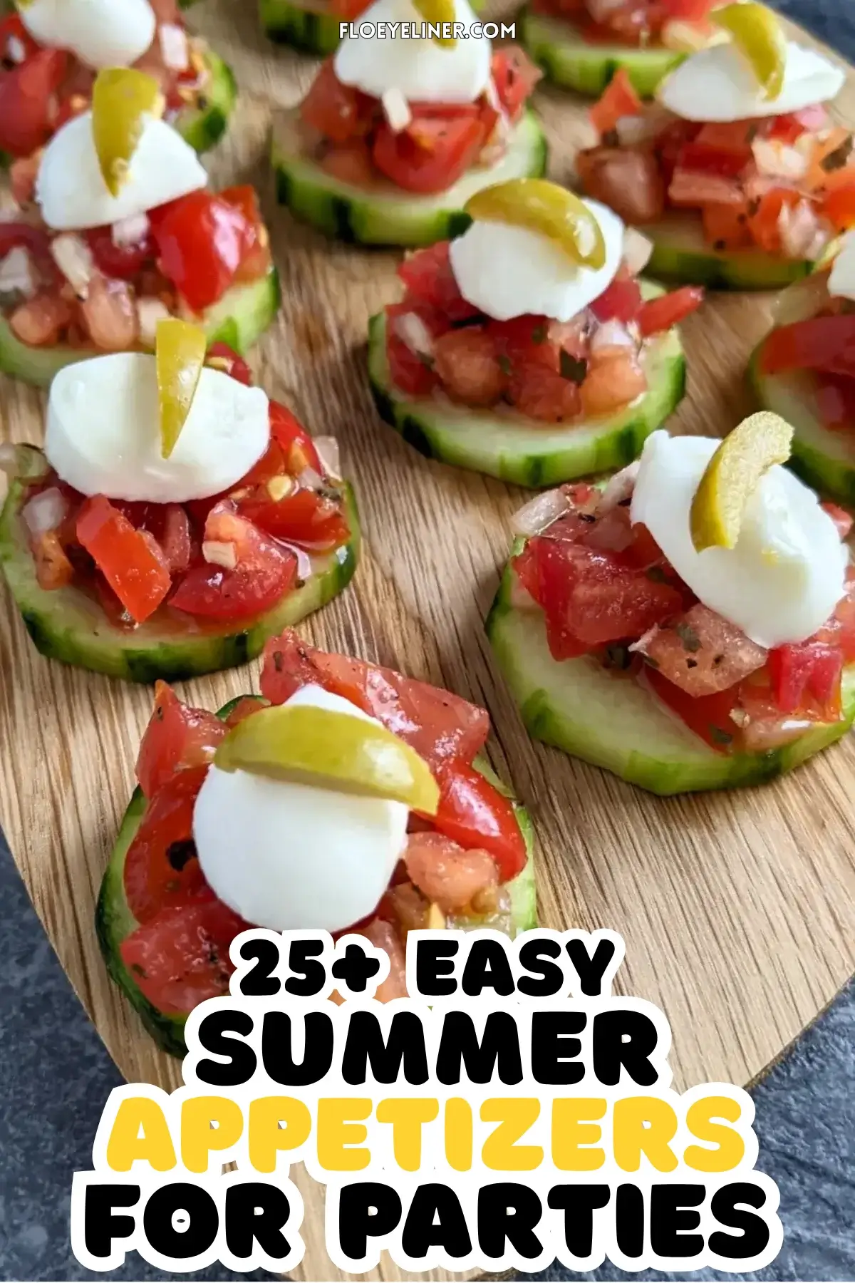 Bruschetta Cucumber Bites Appetizers - Fresh bruschetta cucumber bites appetizers topped with mozzarella balls and sliced olives, neatly arranged on a serving tray.