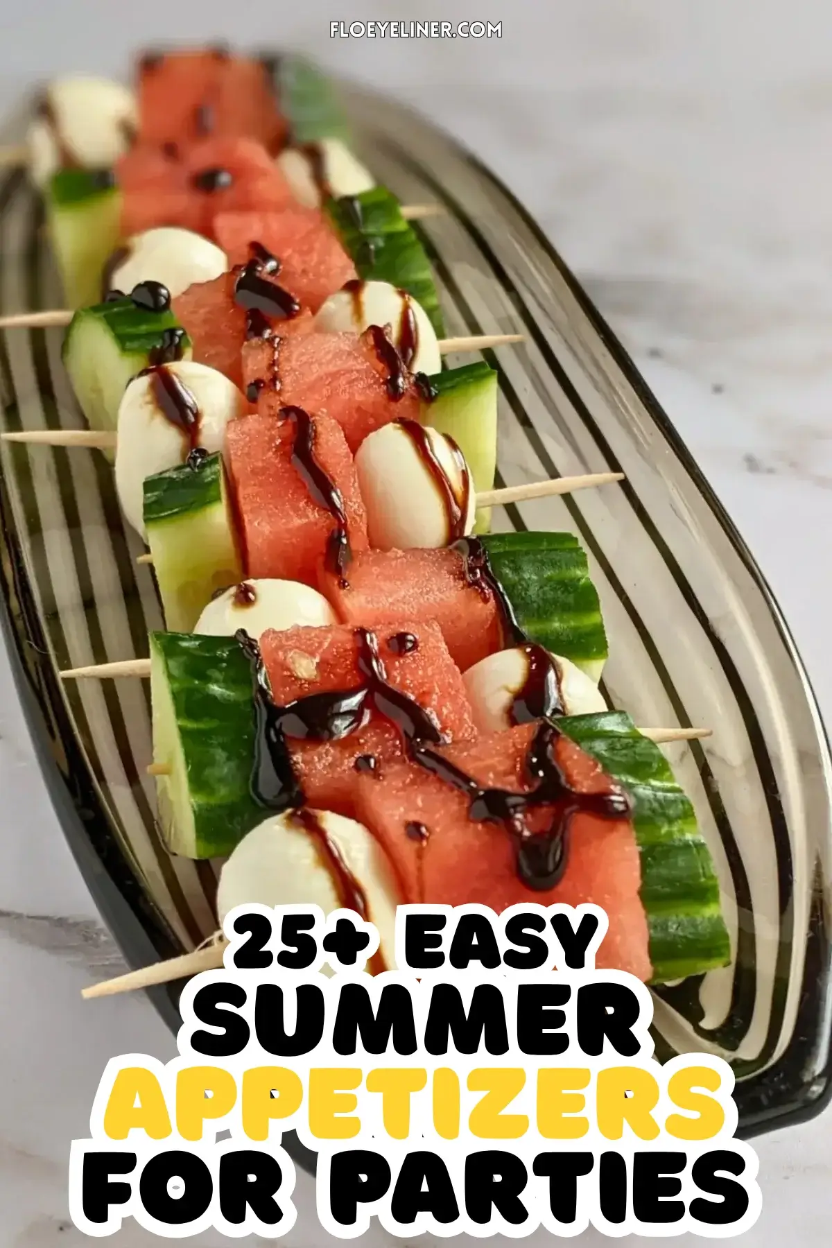 Cucumber Mozzarella Watermelon Appetizer Bites - fruit and cheese skewers made with cubes of watermelon and cucumber on toothpicks, paired with mini mozzarella balls and drizzled with balsamic glaze. 