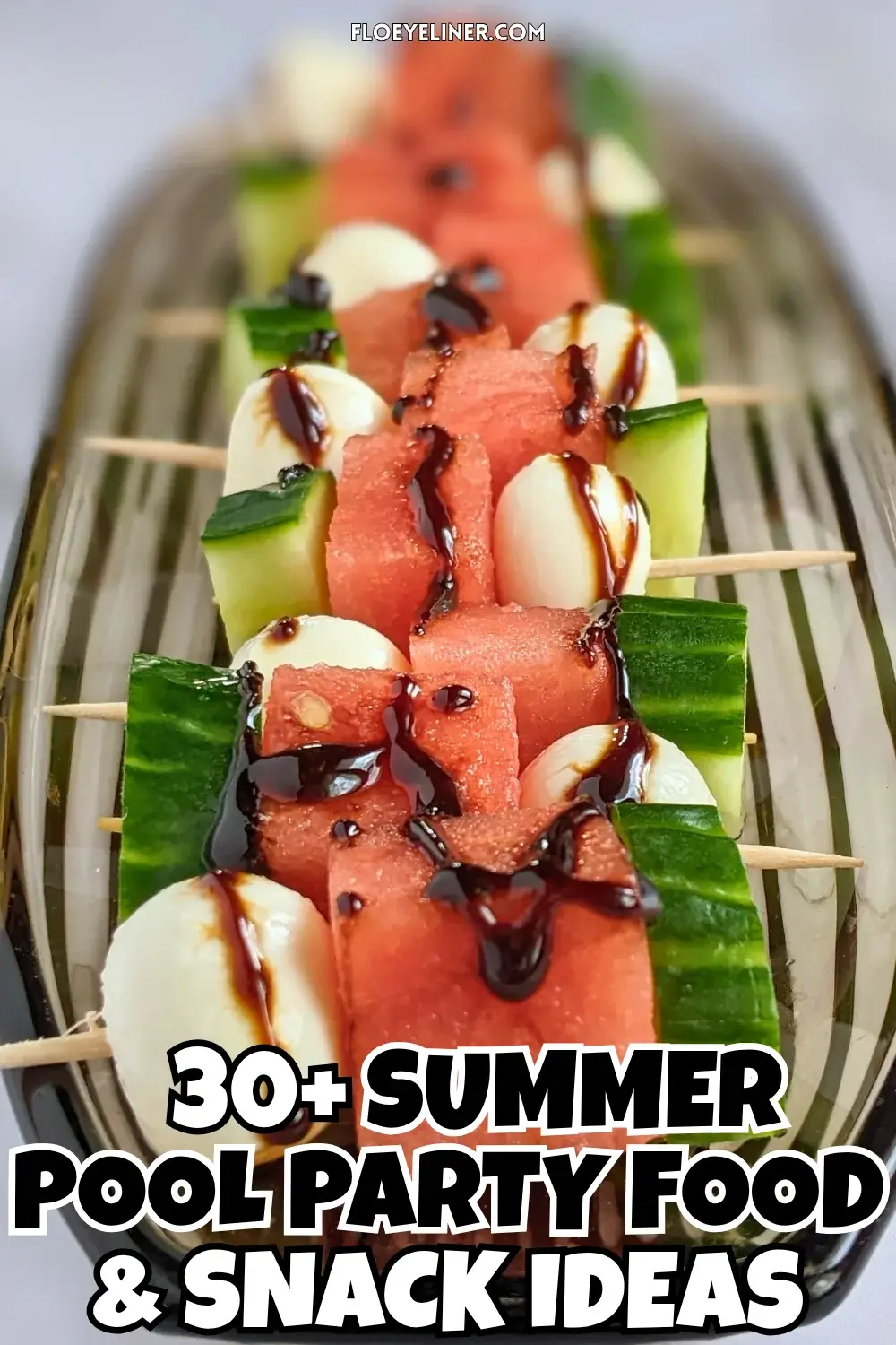 Cucumber Mozzarella Watermelon Appetizer Bites - fruit and cheese skewers made with cubes of watermelon and cucumber on toothpicks, paired with mini mozzarella balls and drizzled with balsamic glaze.