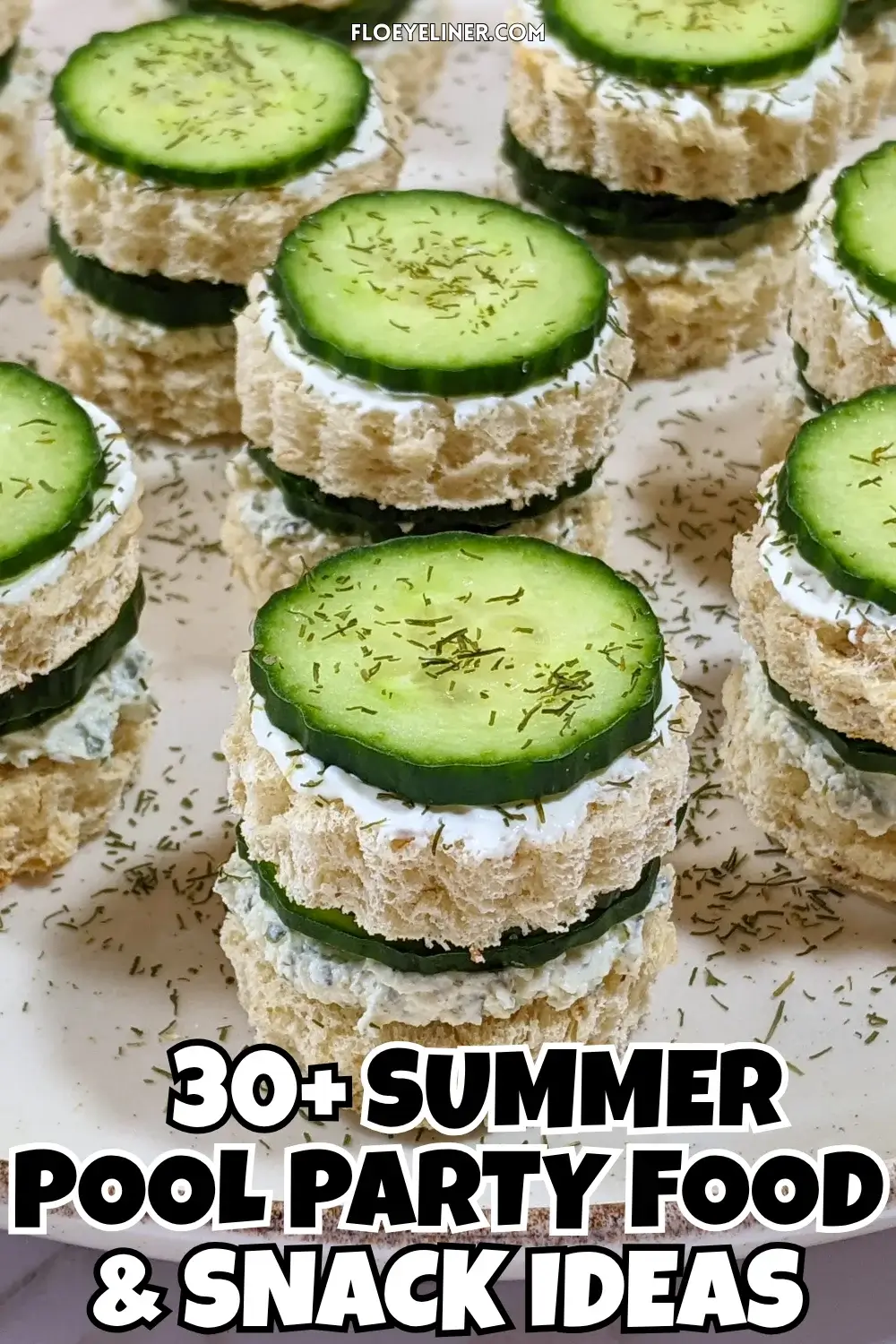 Cucumber Tea Sandwiches With Herb and Garlic Cream Cheese - round double-layered mini sandwiches filled with a homemade herb, garlic,and parmesan cream cheese mix and a layer of fresh cucumbers.