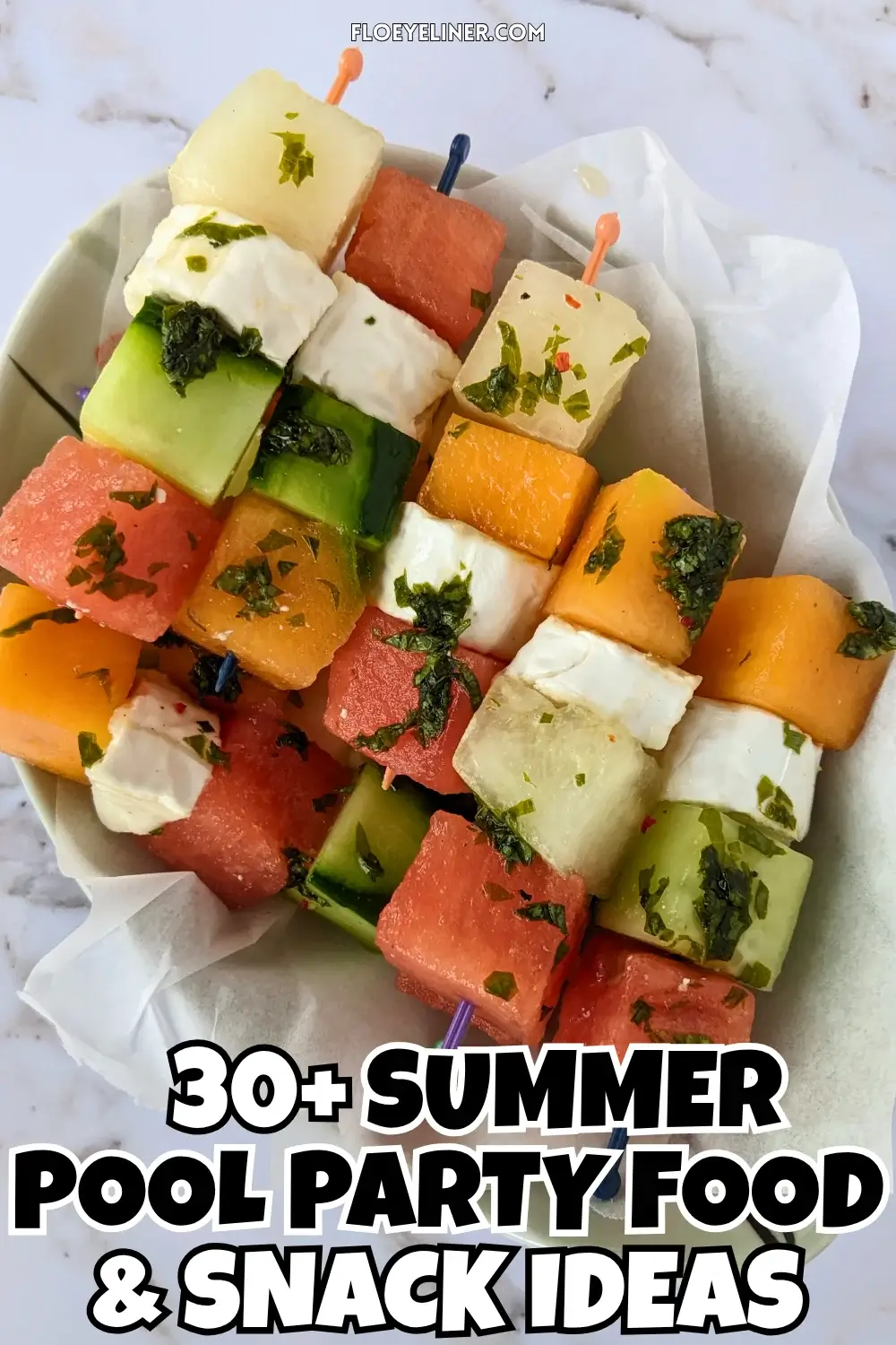Goat Cheese Toothpick Appetizers With Melon, Watermelon, and Cucumber - colorful fruit and cheese skewers made with cubes of melon, watermelon, cucumber, and goat cheese, drizzled with a spicy mint vinaigrette.