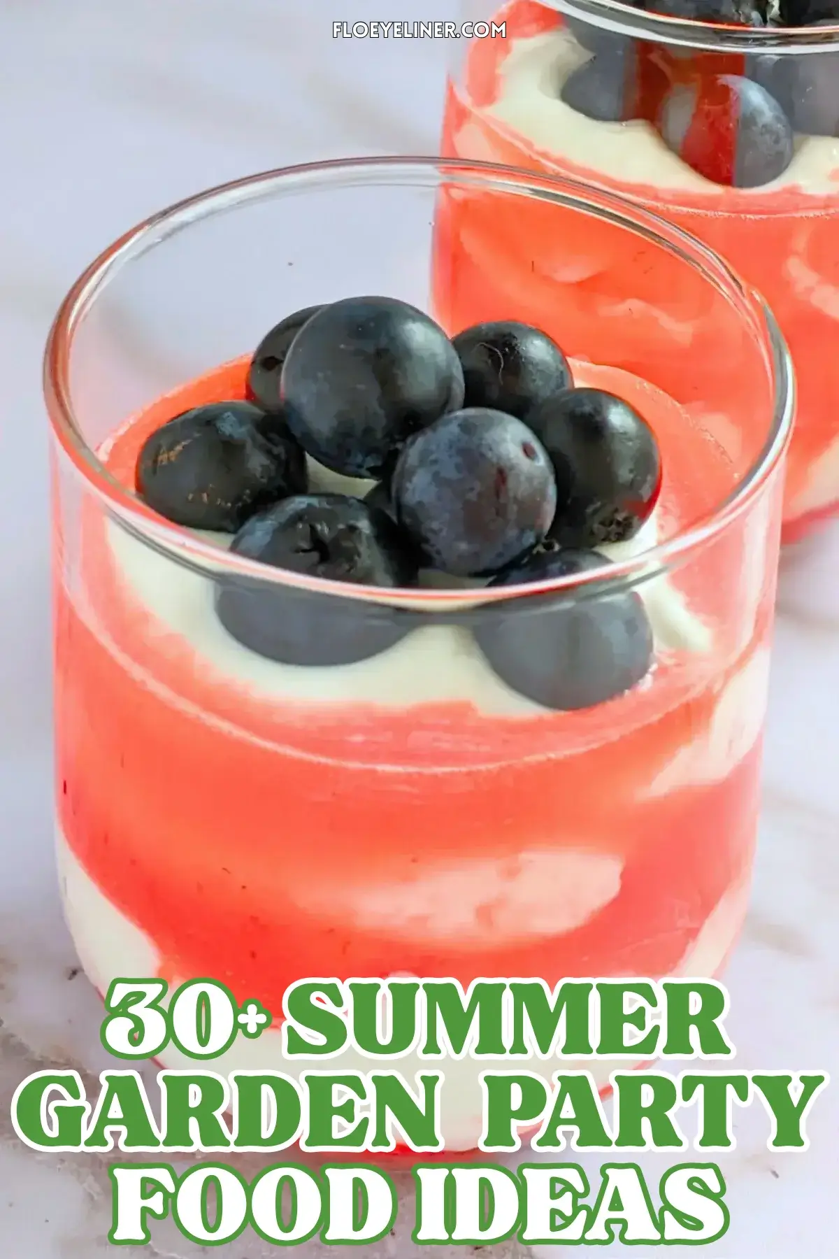 Greek Yogurt Strawberry Fool - whipped Greek yogurt, whipped cream, and strawberry dessert made with alternating layers of stewed strawberries and yogurt-whipped cream mix, topped with blueberries for an extra burst of color.