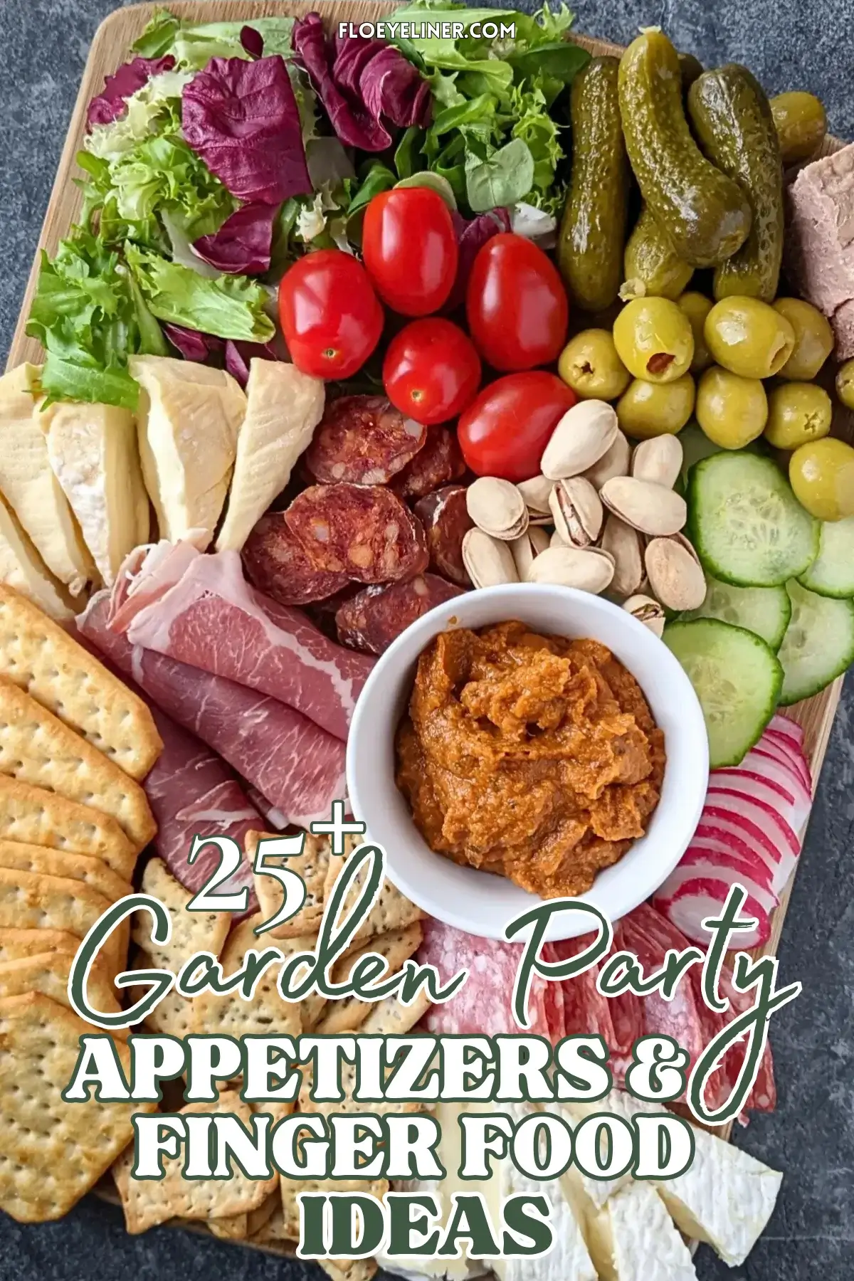 Healthier Charcuterie Appetizer Board - A healthier charcuterie appetizer board featuring fresh vegetables, soft cheeses, sliced meats, and pickled bites on a rustic board.