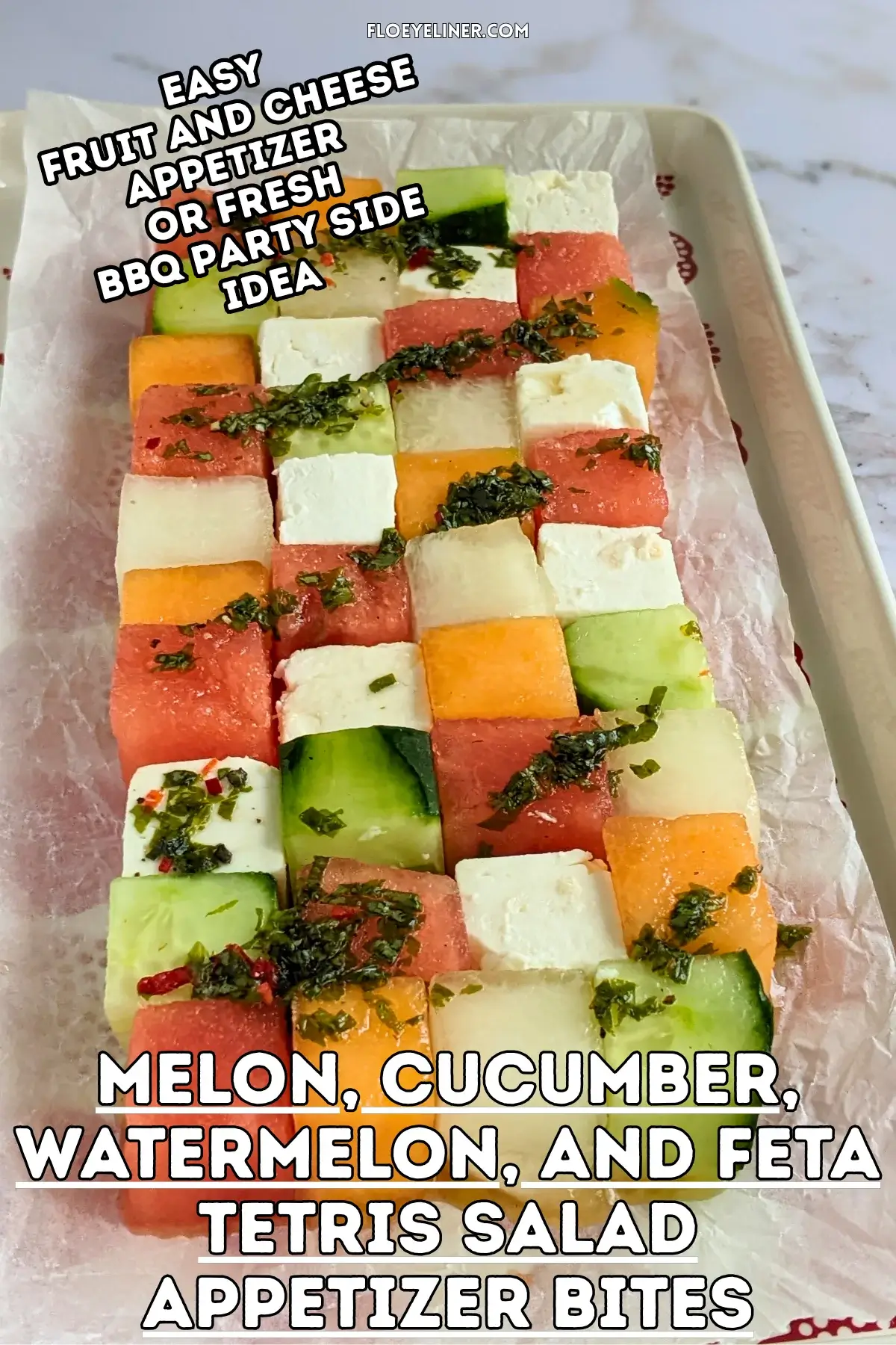 Melon Cucumber Watermelon and Feta Tetris Salad Appetizer Bites - easy fruit and cheese appetizer board with cubed melon, cucumber, watermelon and feta arranged as a grid and Tetris salad with a drizzle of spicy mint vinaigrette.
