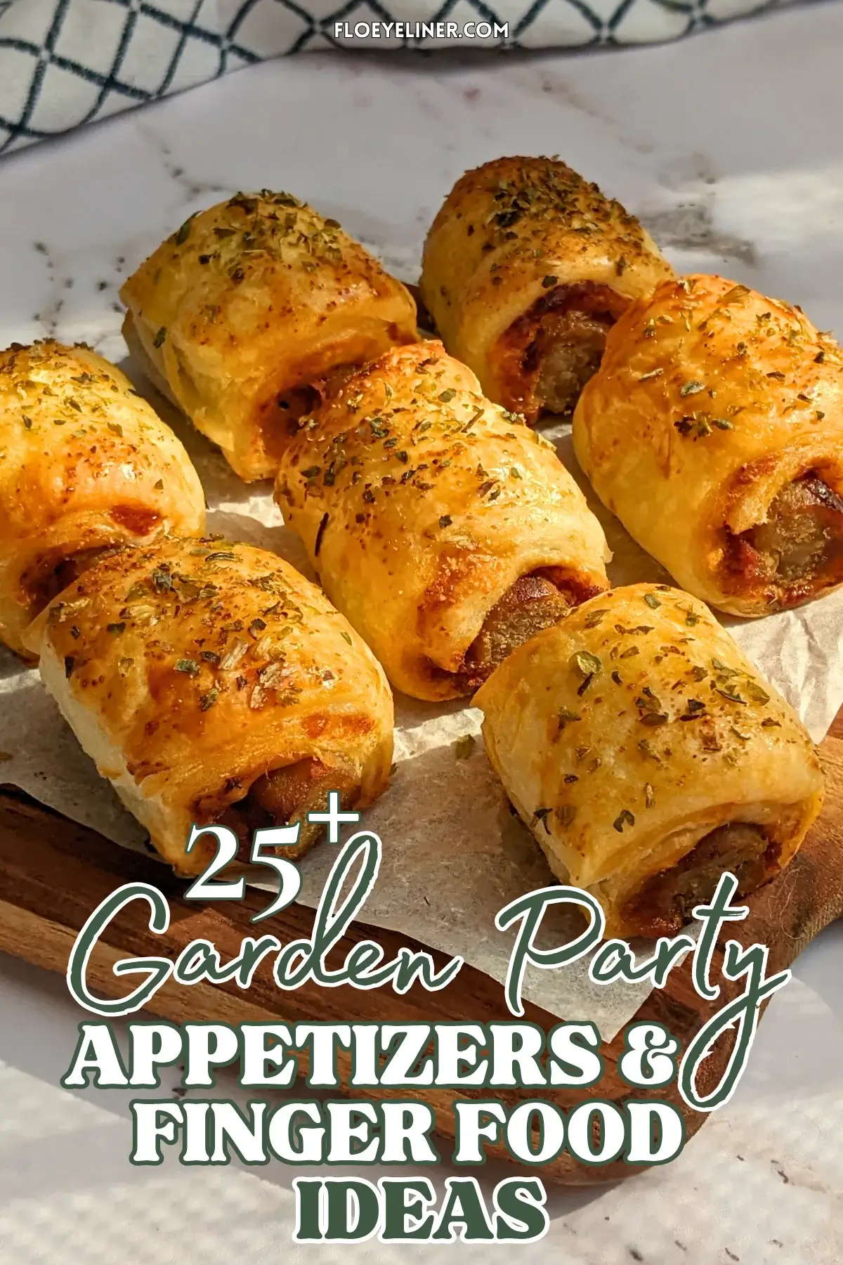 Mini Italian sausage rolls with puff pastry - a puff pastry appetizer filled with baked Italian-style sausages, topped with parmesan cheese and a salsa, mustard, and balsamic vinegar sauce.