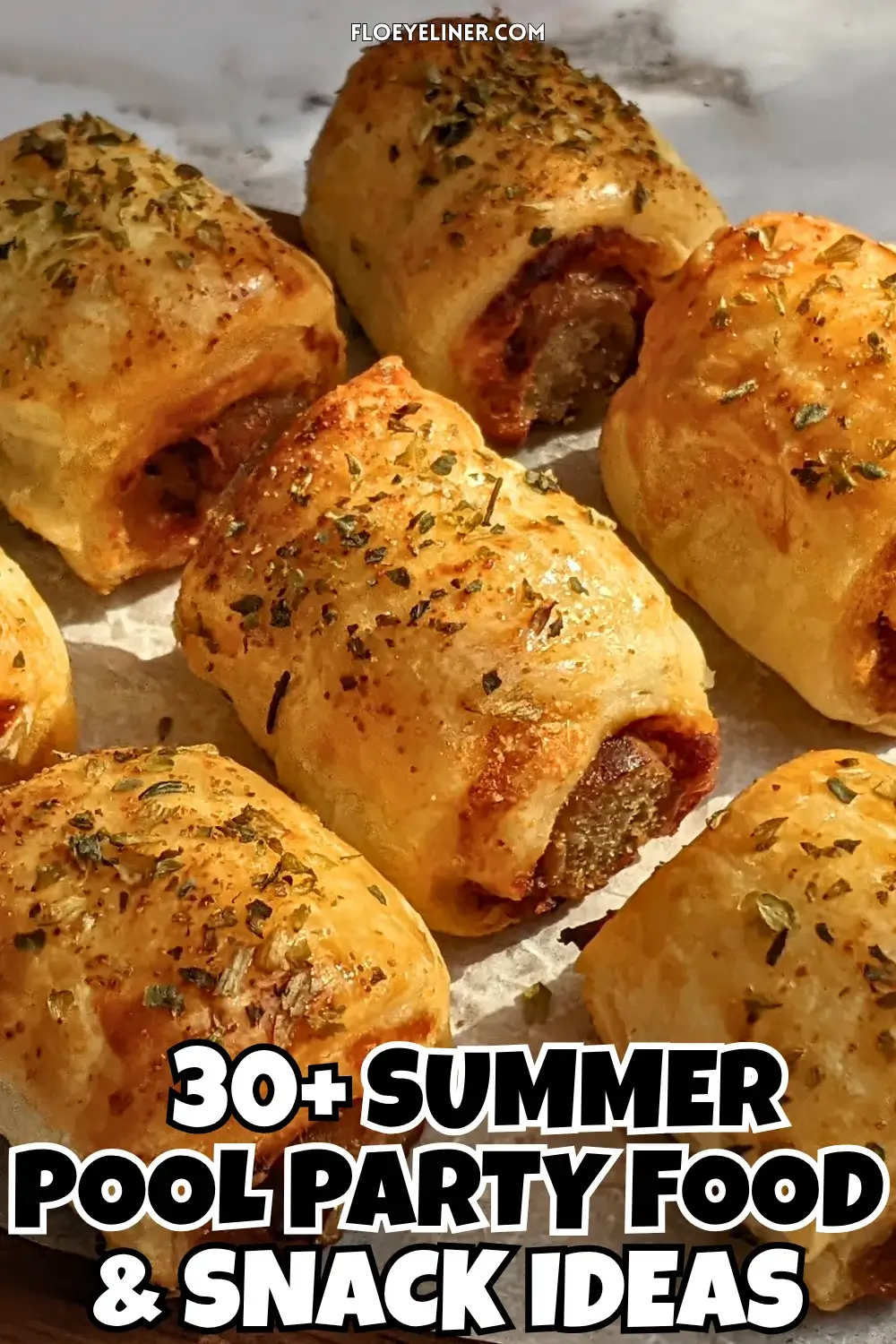 Mini Italian sausage rolls with puff pastry - a puff pastry appetizer filled with baked Italian-style sausages, topped with parmesan cheese and a salsa, mustard, and balsamic vinegar sauce.