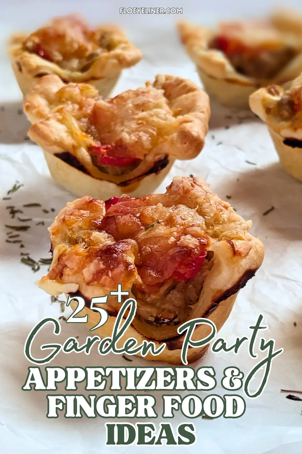 Mini Tuna Tart Cups With Puff Pastry - mini tuna tart appetizers made in a mini muffin tin with a canned tuna and sour cream filling and grated cheese topping in puff pastry cups.