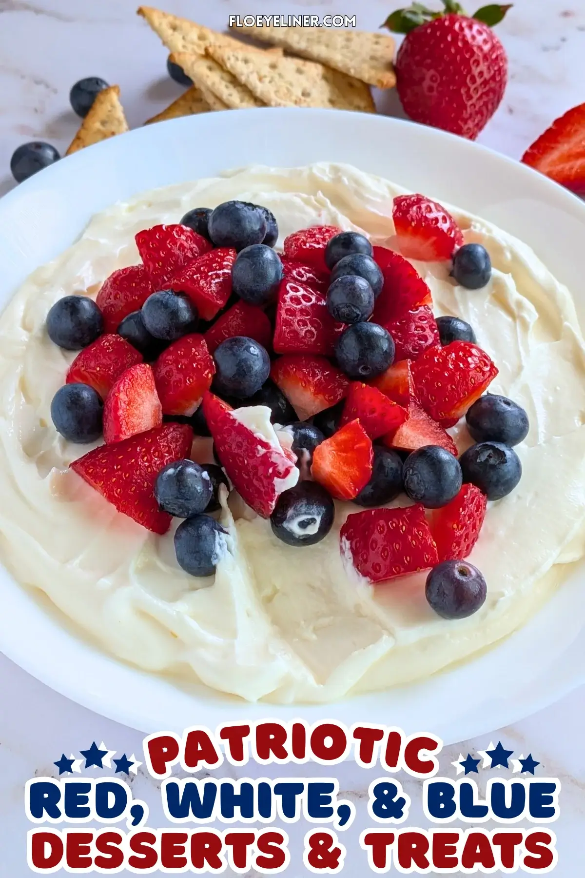Mixed Berry Cheesecake Dessert Dip - fluffy cheesecake dip dessert made with cream cheese, heavy whipping cream, Greek yogurt, and topped with fresh strawberries and blueberries.