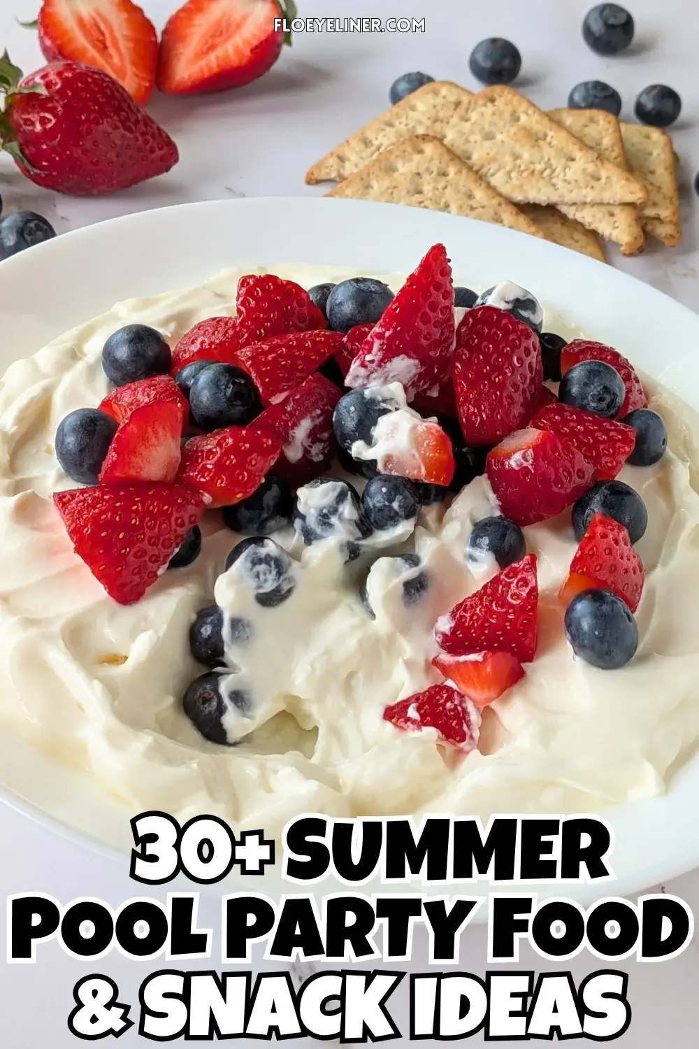 Mixed Berry Cheesecake Dessert Dip - fluffy cheesecake dip dessert made with cream cheese, heavy whipping cream, Greek yogurt, and topped with fresh strawberries and blueberries.