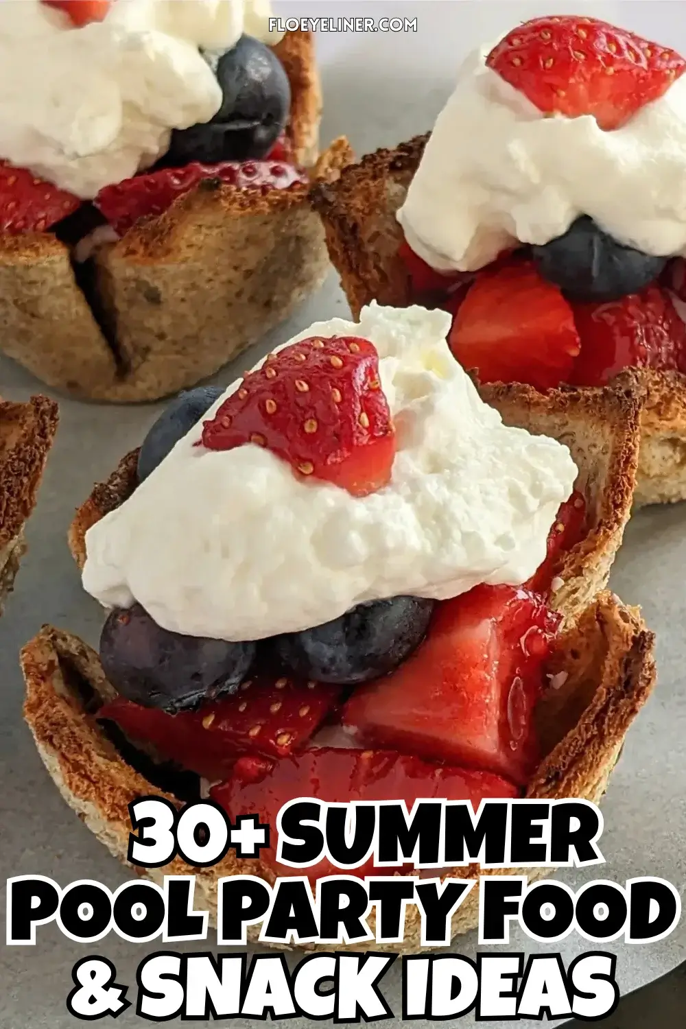 Mixed Berry Dessert Toast Cups With Whipped Cream - muffin-tin baked mini dessert cups made from white bread, filled with a spoon of sweet ricotta and mixed berries like strawberries and blueberries, topped with whipped cream.