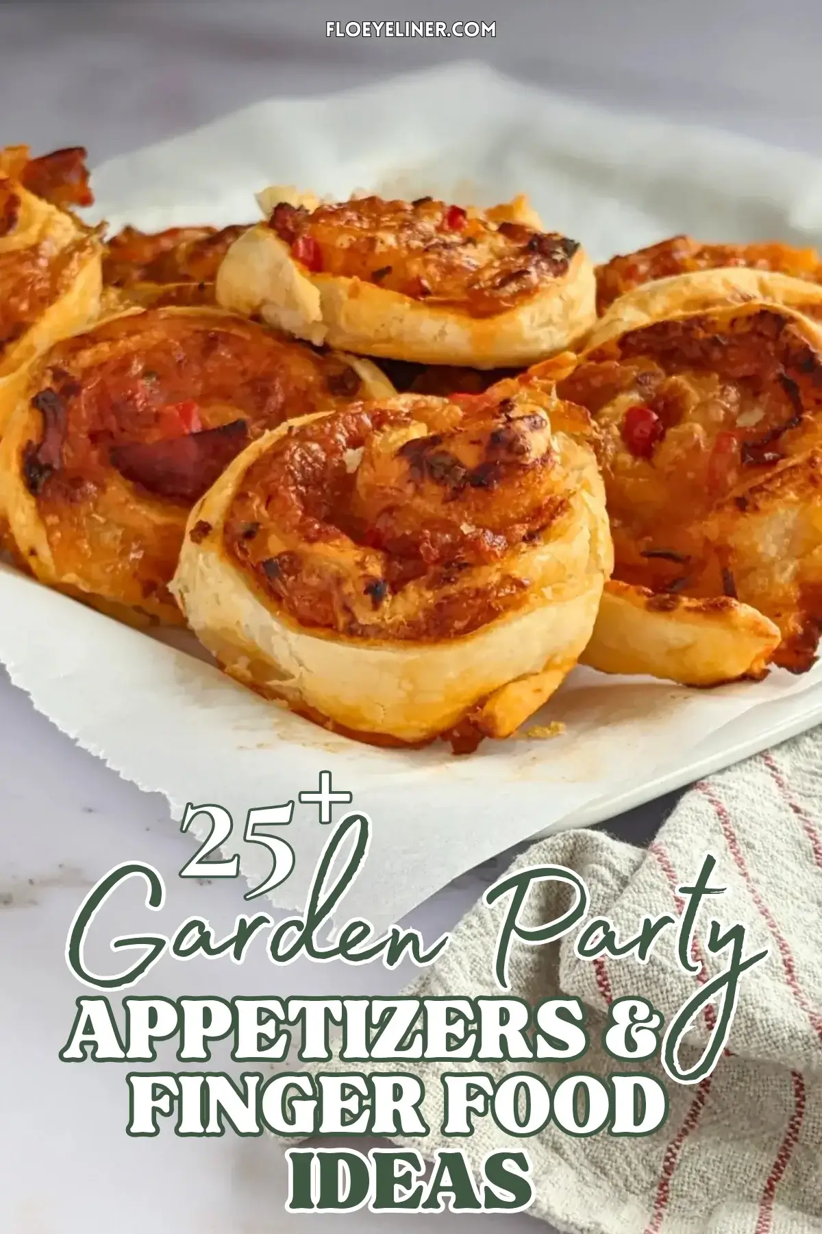 Pizza Pinwheels - Golden brown pizza pinwheels filled with tomato sauce, salami, and melted cheese.