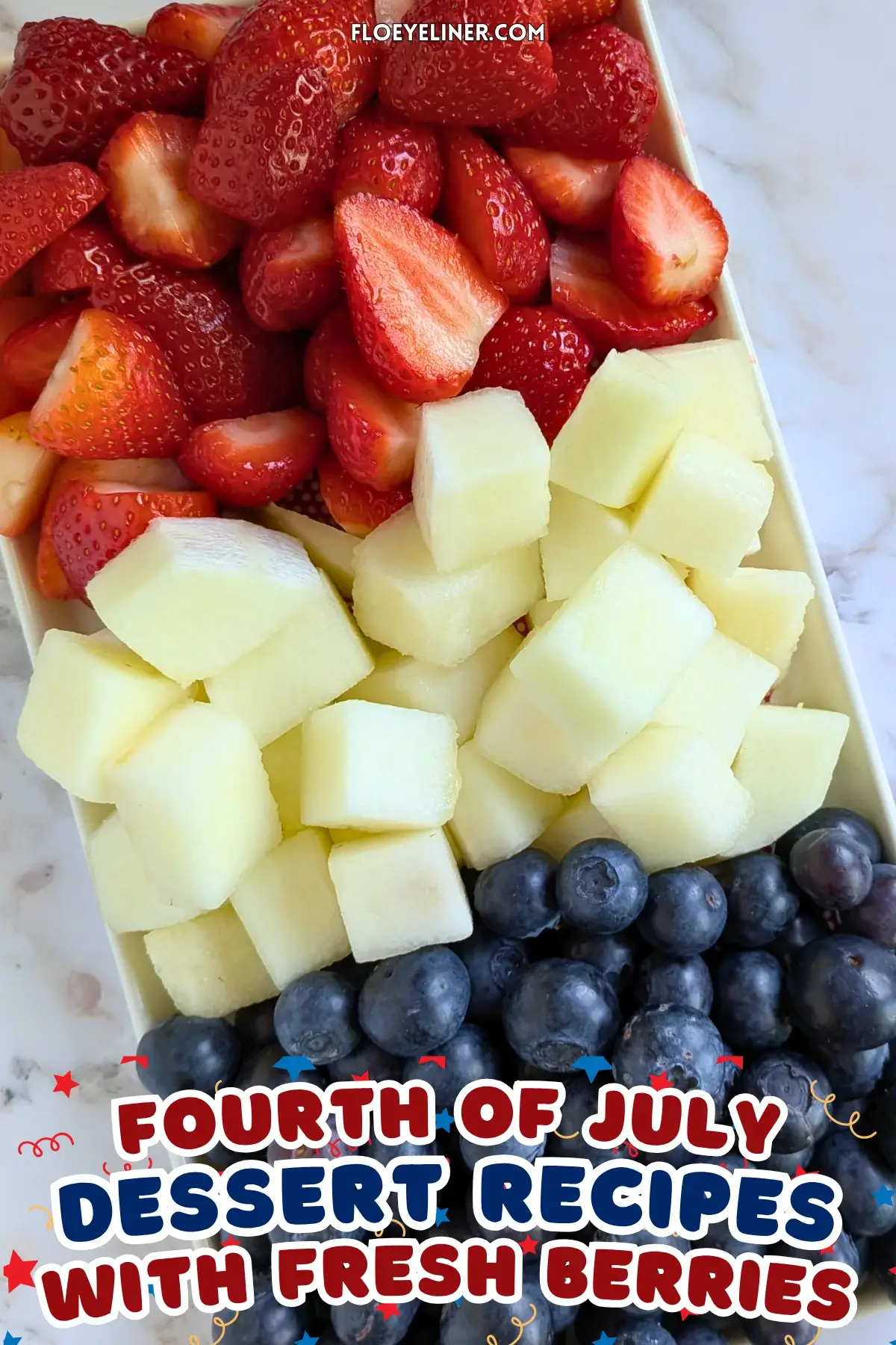 Red, White and Blue Fruit Tray - easy festive party fruit platter made with cut red strawberries, white honeydew melon, and blue blueberries for a red, white, and blue themed summer dessert or snack board.