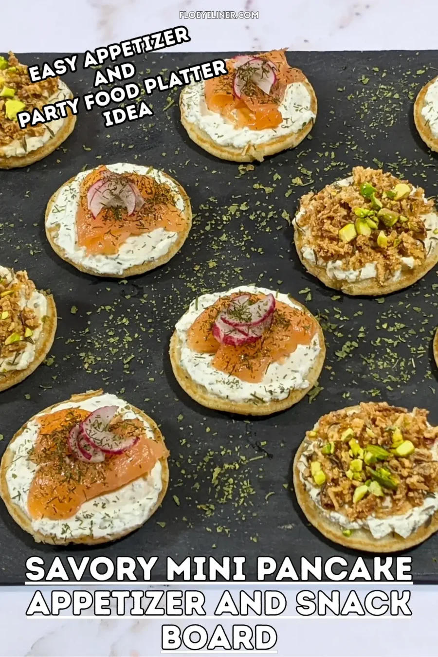 Savory Mini Pancake Appetizer and Snack Board - savory mini pancakes party platter with two types of canapes - mini pancakes topped with a creamy herb-and-garlic cream cheese spread, crispy dried onions, maple syrup, and crushed pistachios and mini pancakes topped with a creamy lemon-dill cream cheese spread, pieces of smoked salmon, and radish slices.