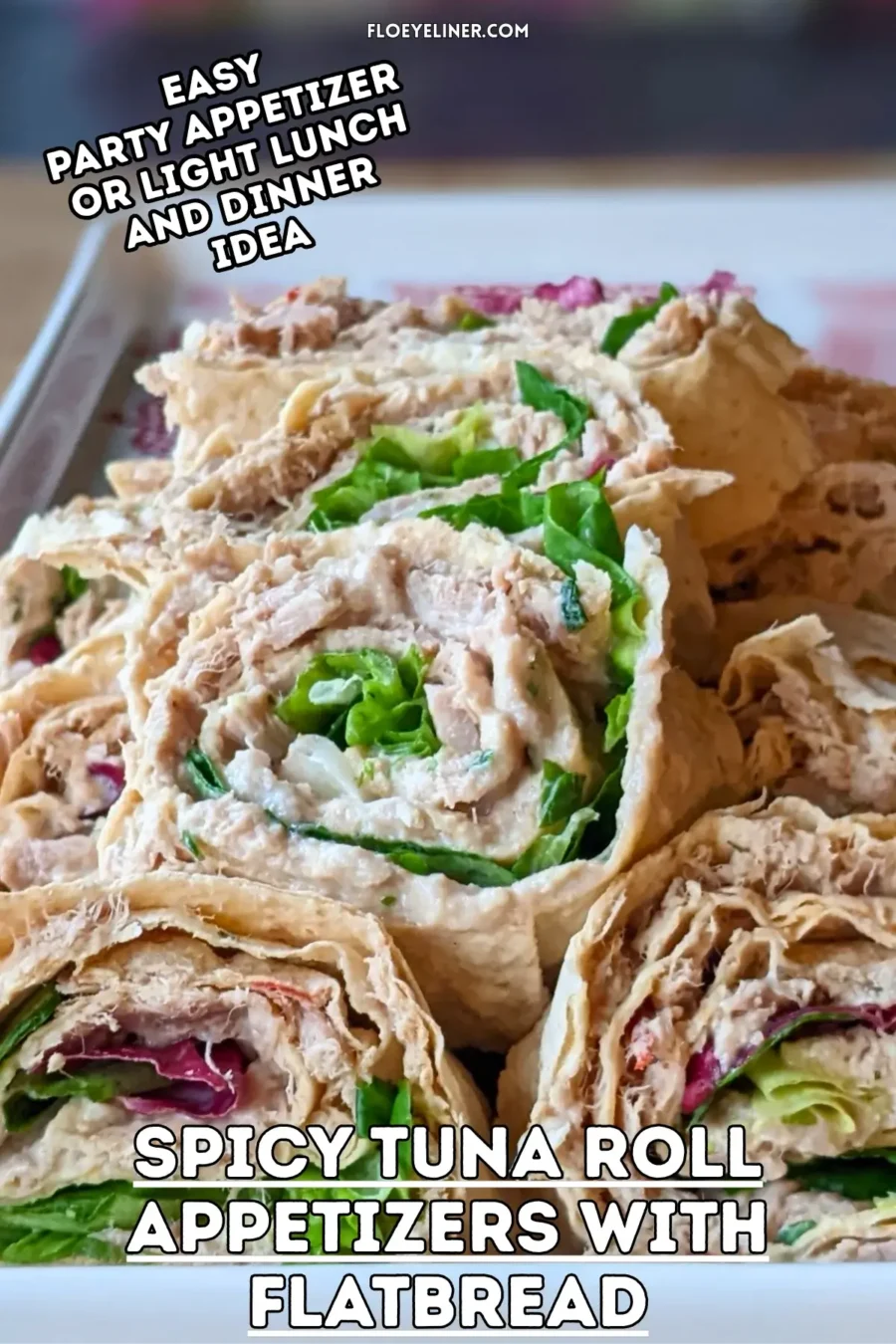 Spicy Tuna Roll Appetizers With Flatbread - spicy tuna rolls/pinwheels made with lavash flatbread and filled with a mix of tuna, mustard, Greek yogurt and fresh salad leaves.