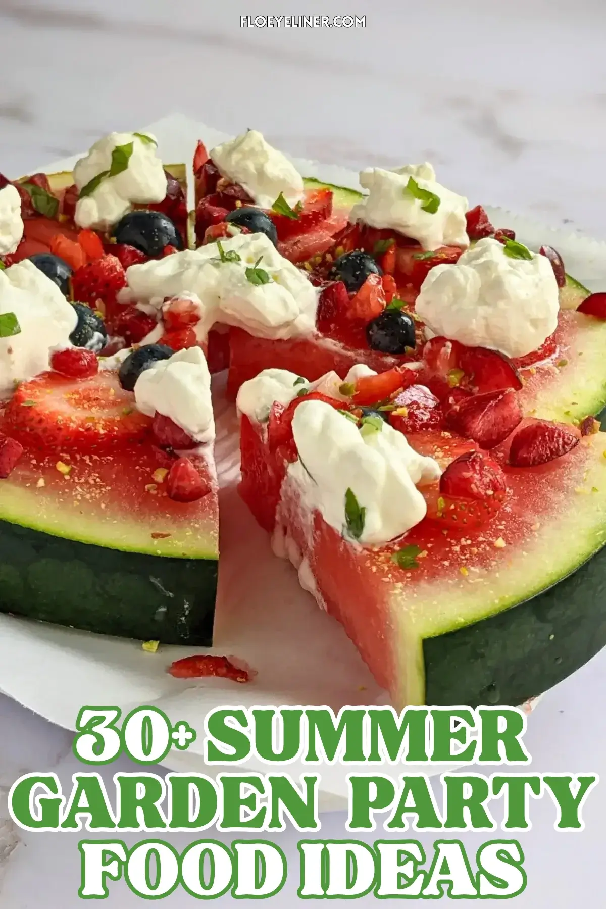 Watermelon Fruit Pizza With Berries and Whipped Cream - fruity dessert pizza on a base of a fresh watermelon slice, topped with blueberries, strawberries, cherries, dollops of whipped cream, and crushed pistachios.
