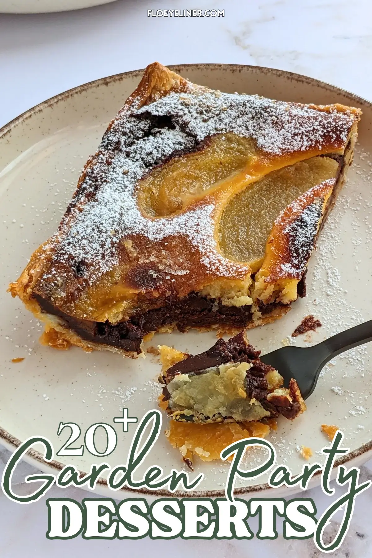 French Chocolate Tart With Pears - easy sweet dessert tart made with puff pastry, buttery melted dark chocolate, and topped with canned pears, sprinkled with powdered sugar for garnish.