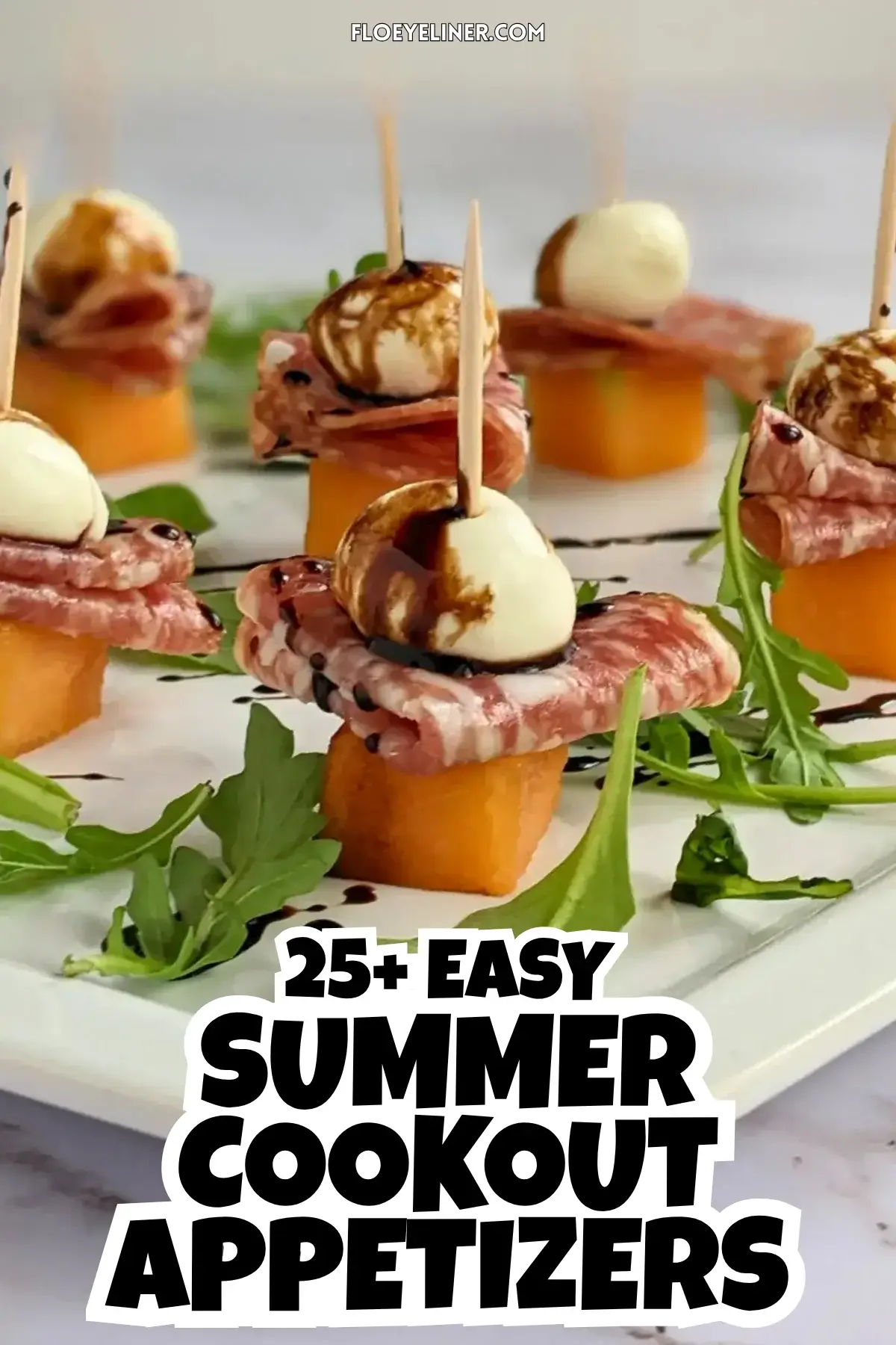 Melon and Salami Toothpick Appetizers With Mozzarella - easy fruit and cheese skewers made with melon, dried salami, and mini mozzarella balls served on a bed of arugula and topped with a balsamic glaze.